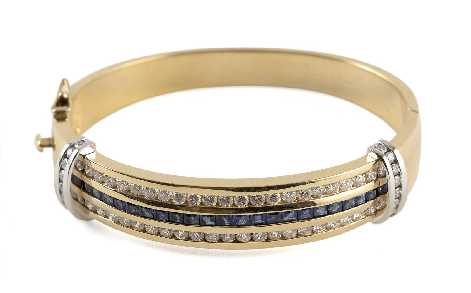 14KT YELLOW AND WHITE GOLD, DIAMOND AND SAPPHIRE BANGLE BRACELET Approx. 37.3 total dwt.