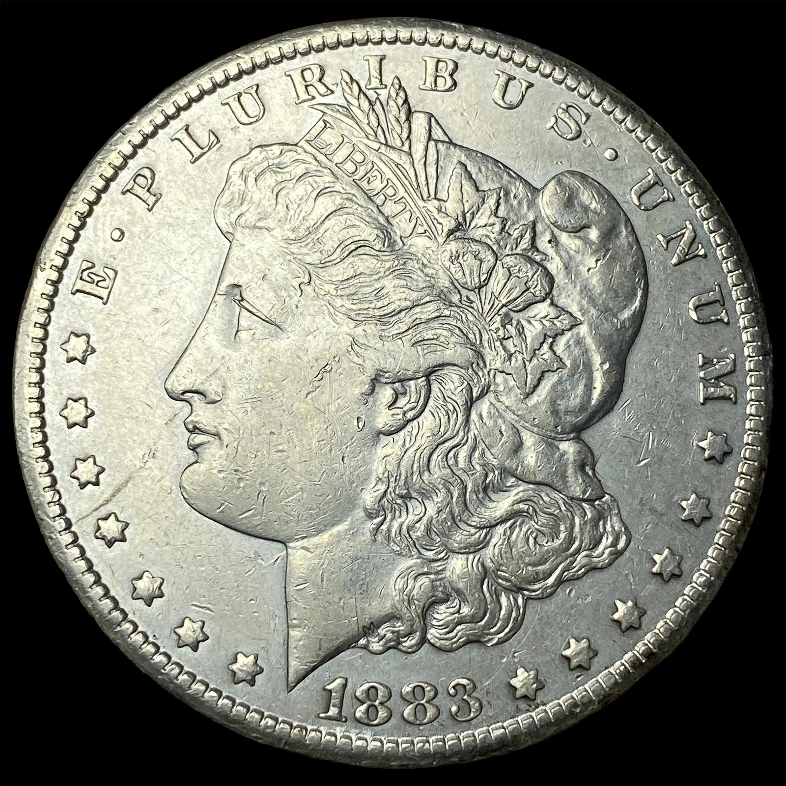 1883-CC Silver Morgan Dollar NEARLY UNCIRCULATED