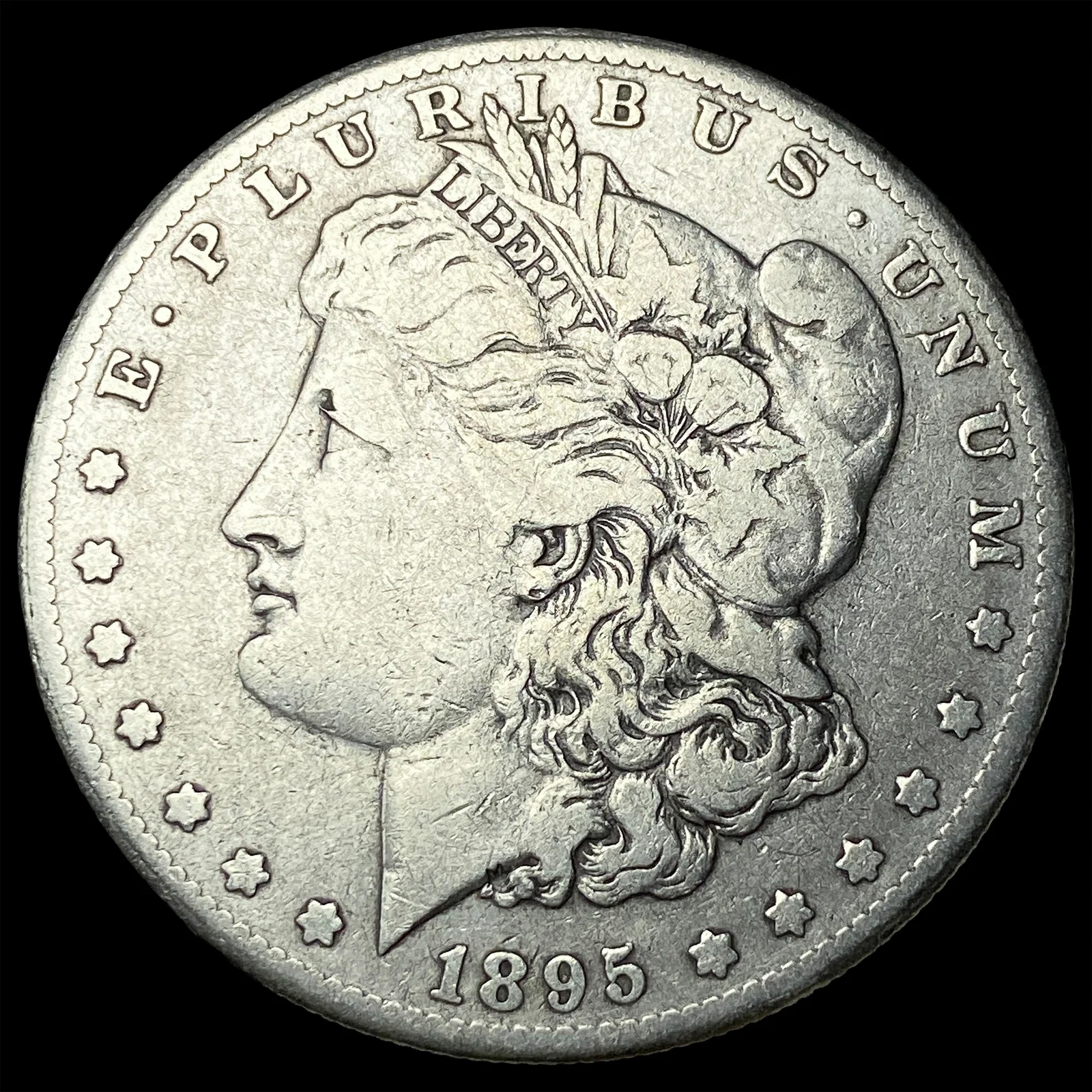 1895-O Silver Morgan Dollar ABOUT UNCIRCULATED