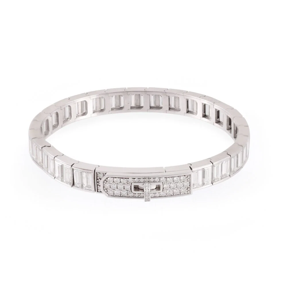 18KT GOLD BRACELET SET WITH EMERALD-CUT AND ROUND-CUT DIAMONDS, BY HERMÈS 'Kelly'