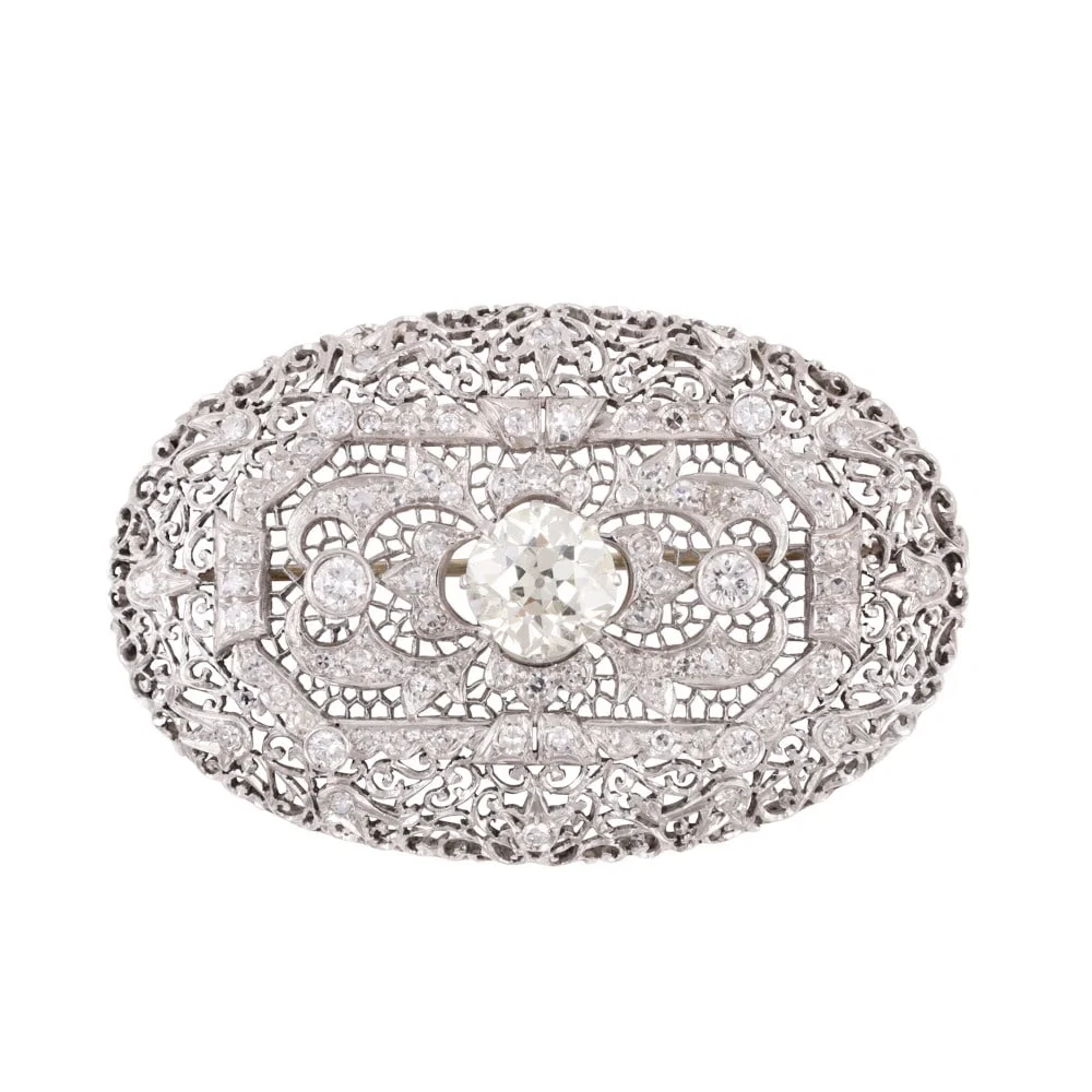 18KT GOLD BROOCH SET WITH DIAMONDS