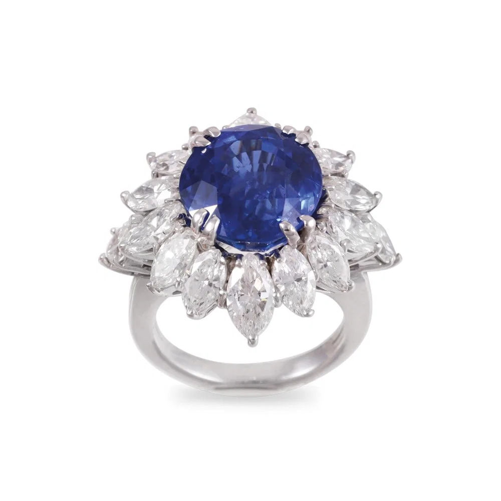 18KT GOLD RING SET WITH SAPPHIRE AND DIAMONDS
