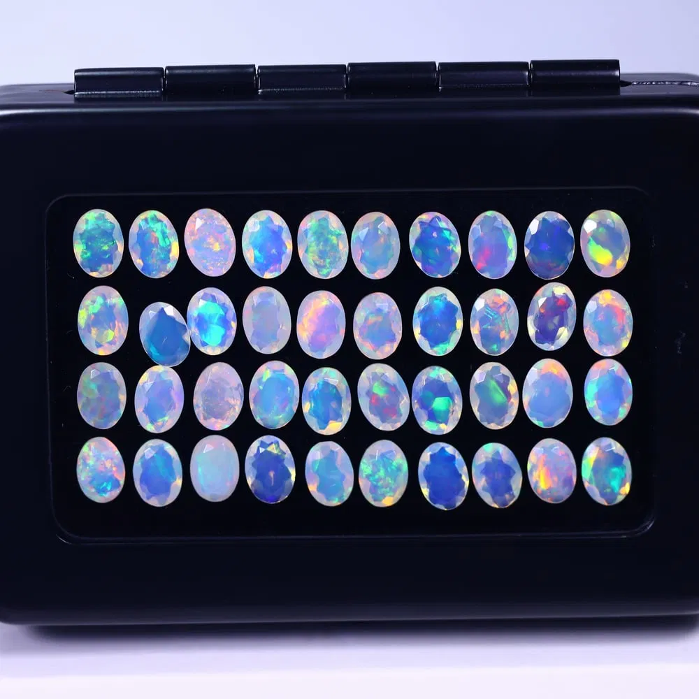 *19.50Ct Calibrated 7x5mm Faceted Welo Opal Set - Ethiopian Opal, 135E