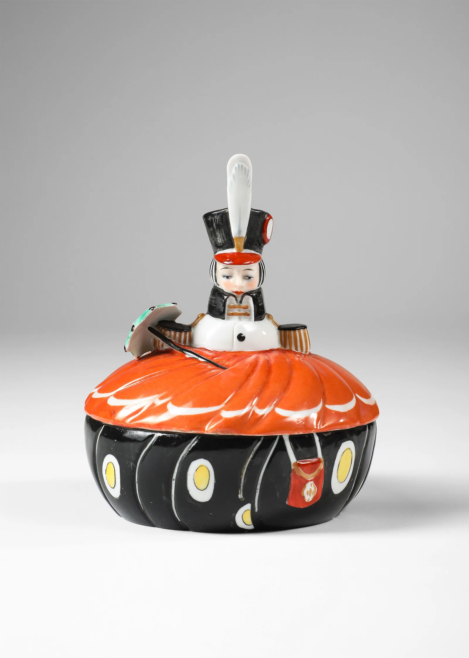 1920s Art Deco Goebel porcelain powder box depicting an upscale doorman