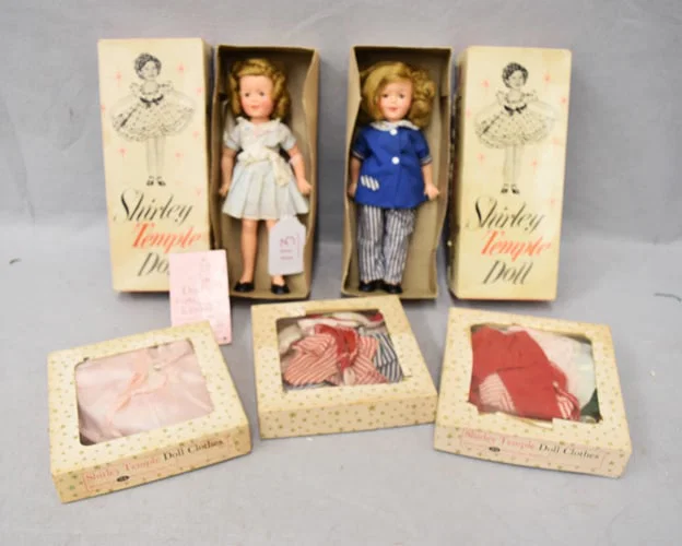 (2) SHIRLEY TEMPLE DOLLS & CLOTHING