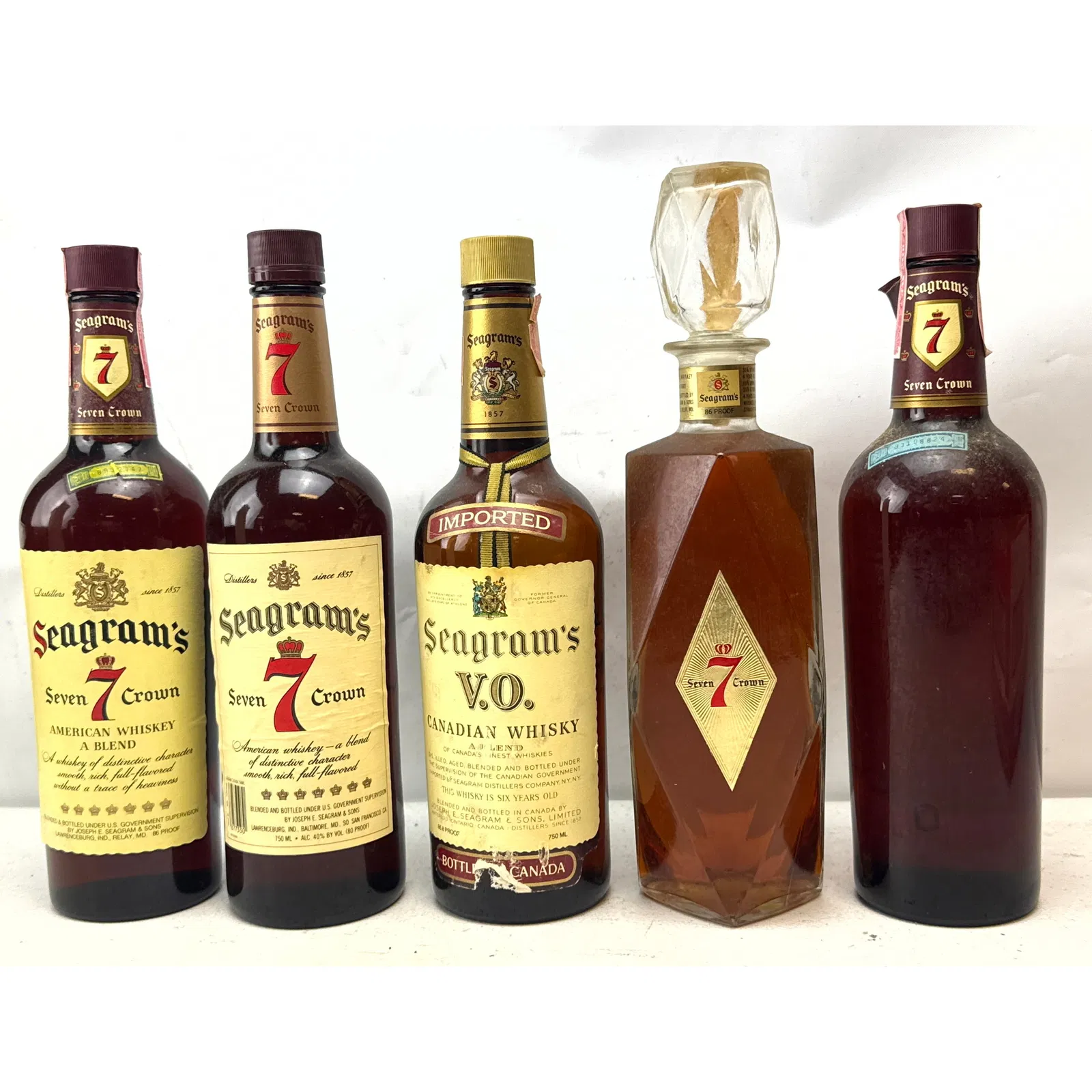 5 Bottles Whiskey. Seagrams 7 Whiskey.