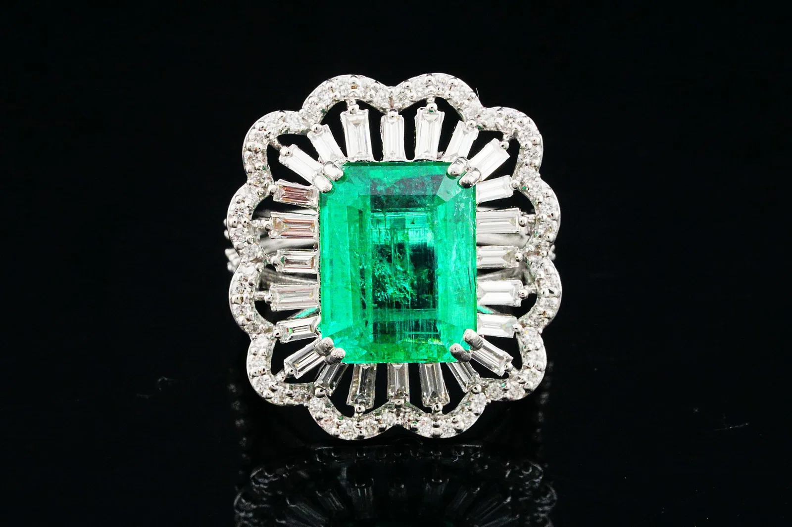 6.50ct Emerald, 1.55ctw VS1-SI1/G-H Diamond, 18K Ring