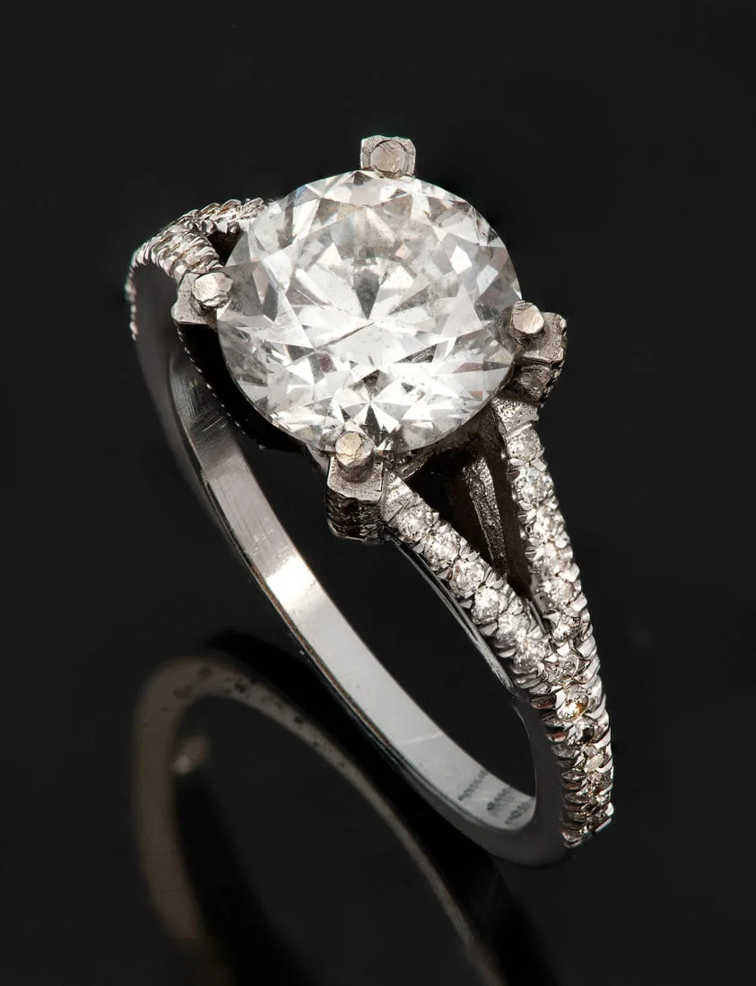 A 14K White Gold Diamond Solitaire Ring