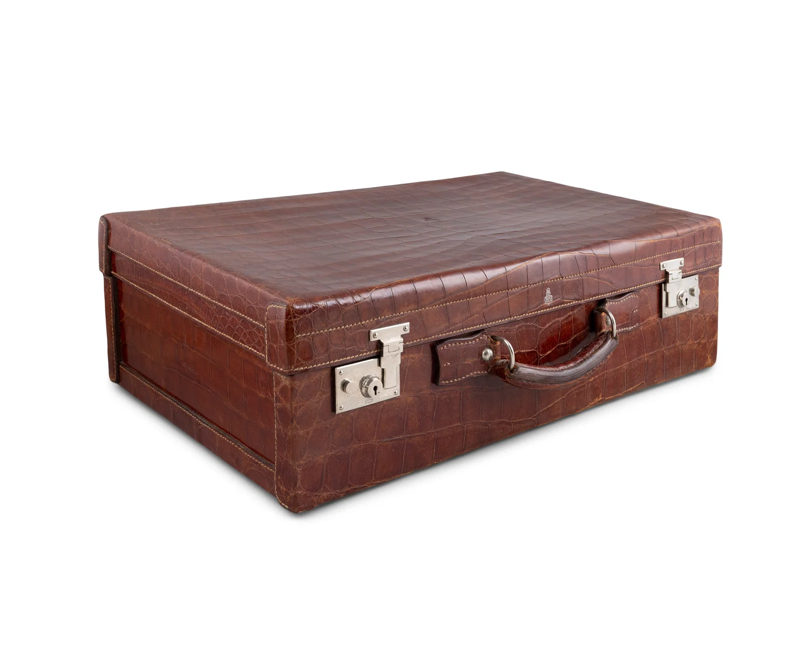 A 1930S MARK CROSS ALLIGATOR SKIN TRAVELLING SUITCASE rectangular form, with carrying handle, with