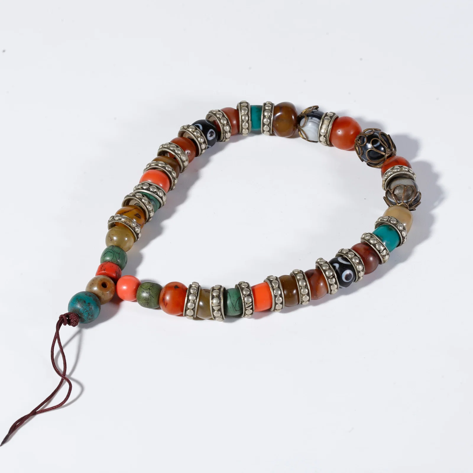 A AGATE CARVED HAND-HELD ORNAMENT