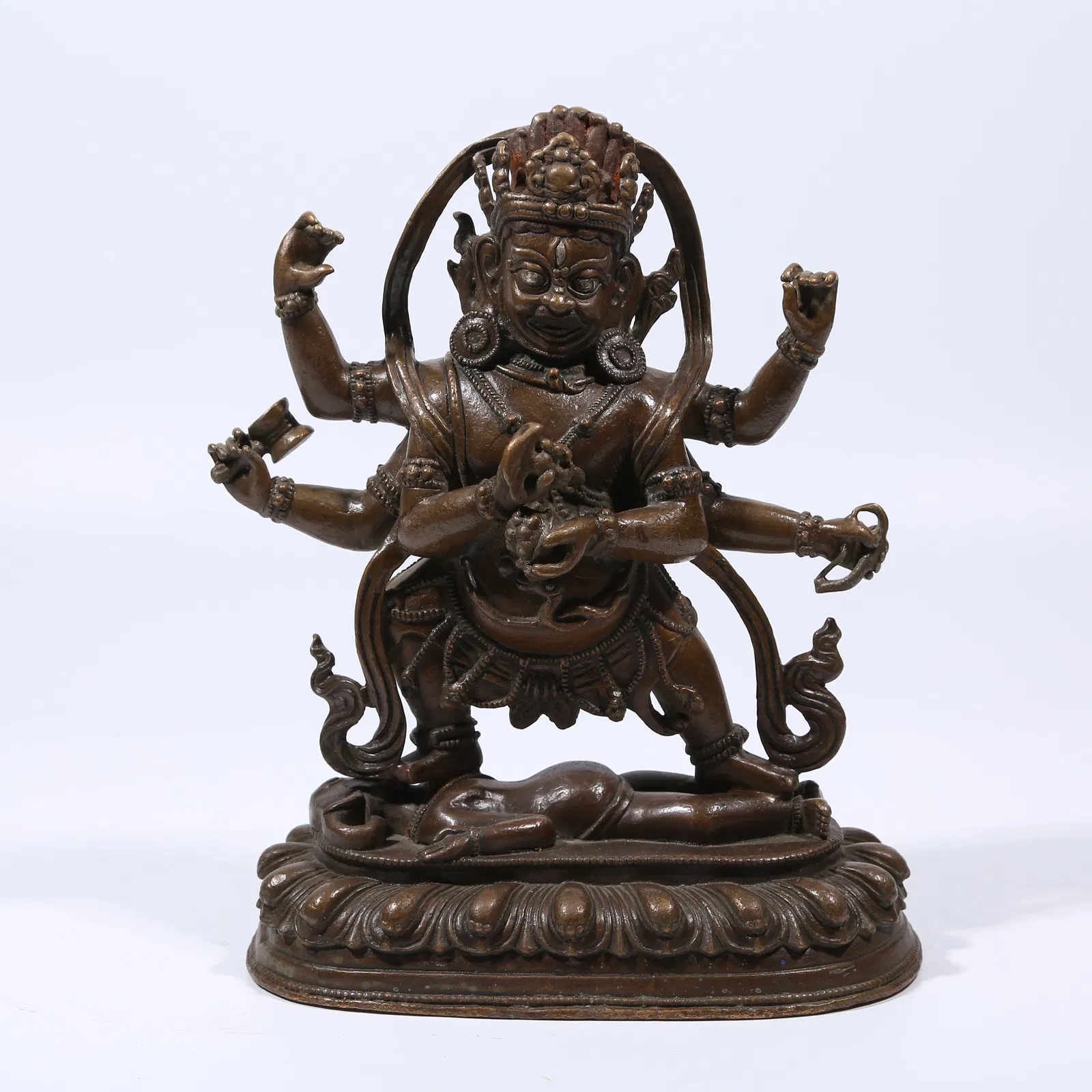 A ALLOY BRONZE SIX-ARMED MAHAKALA STATUE