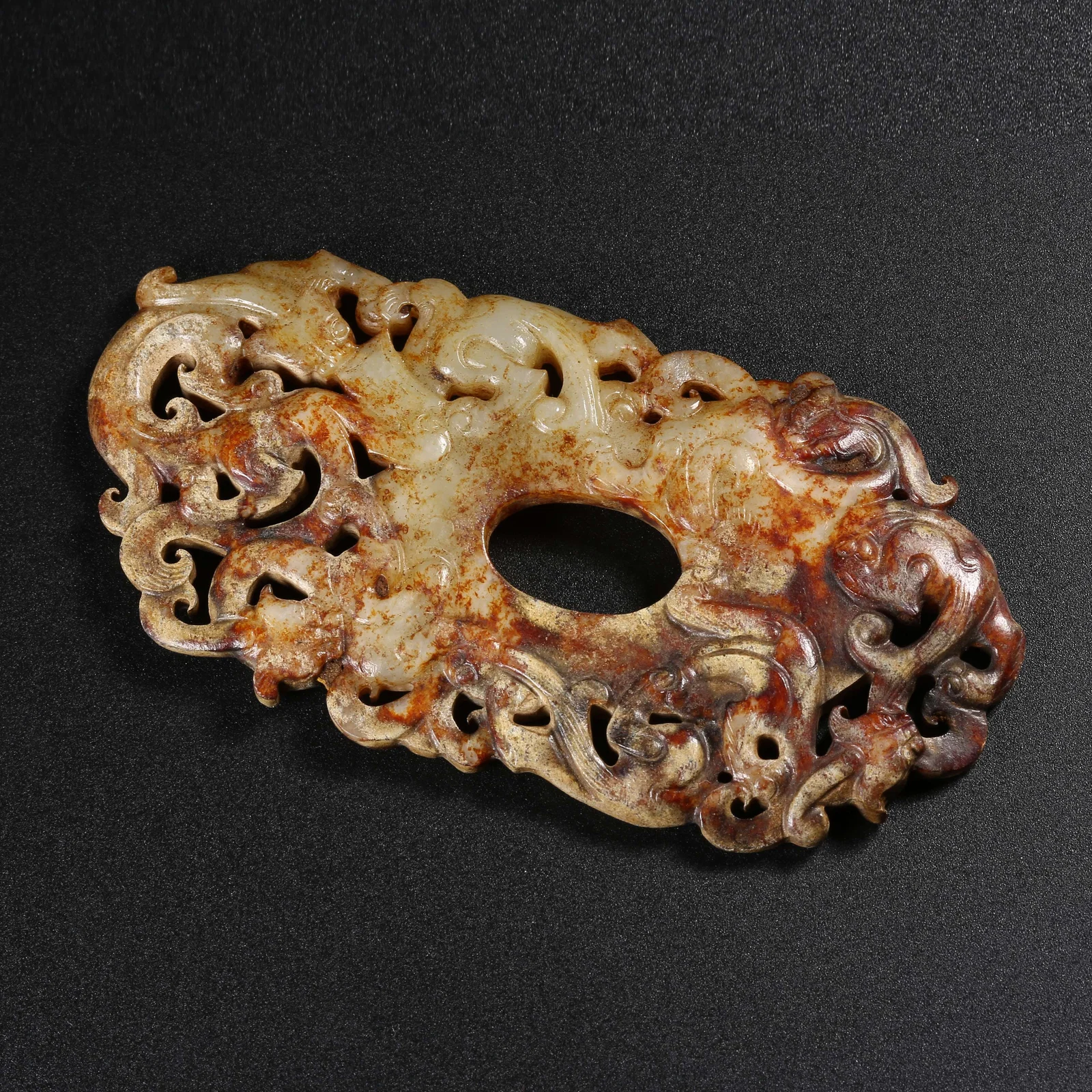 A ANCIENT JADE "CHI DRAGON" CHICKEN-HEART PENDANT