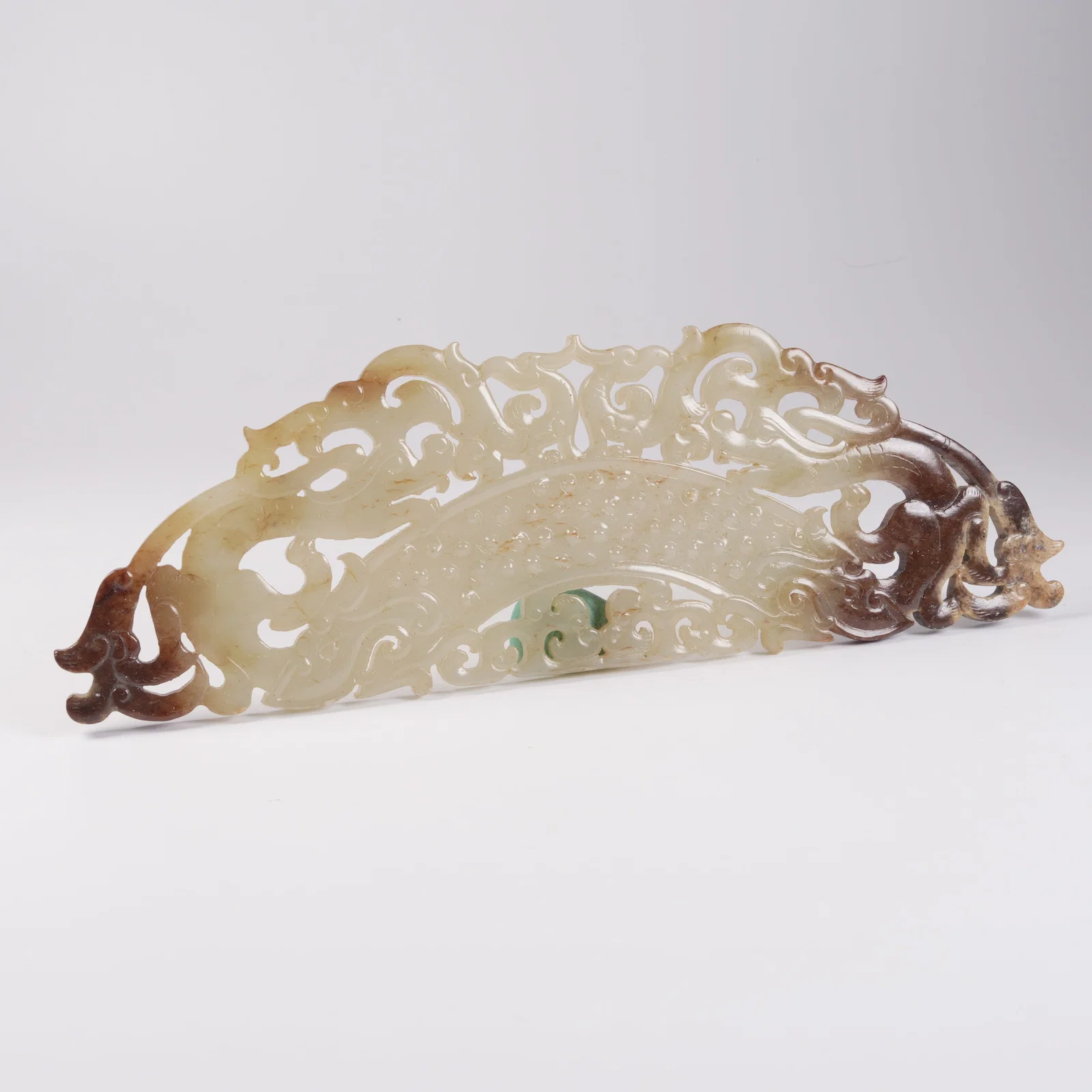 A ANCIENT JADE HUANG PENDANT WITH DRAGON MOTIF