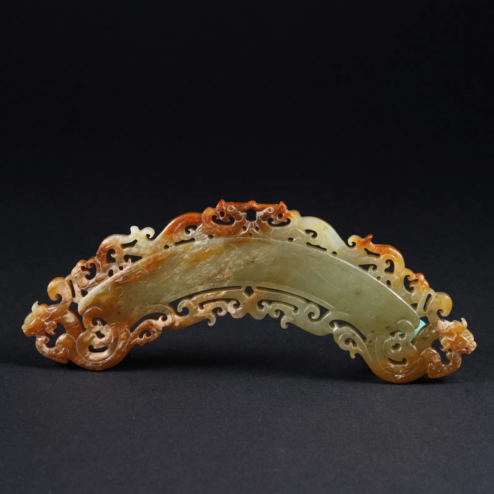 A ANCIENT JADE PENDANT WITH DRAGON MOTIF
