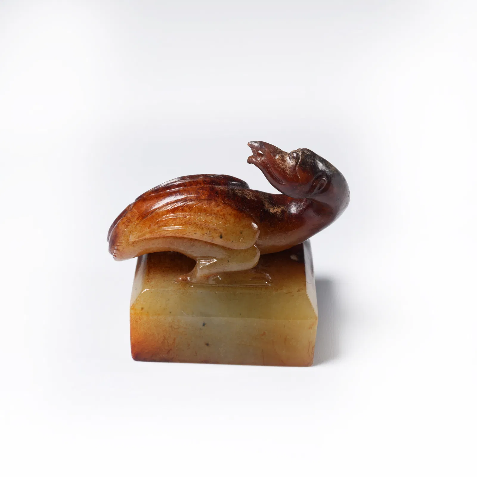 A ANCIENT JADE SEAL WITH BIRD-SHAPED KNOP