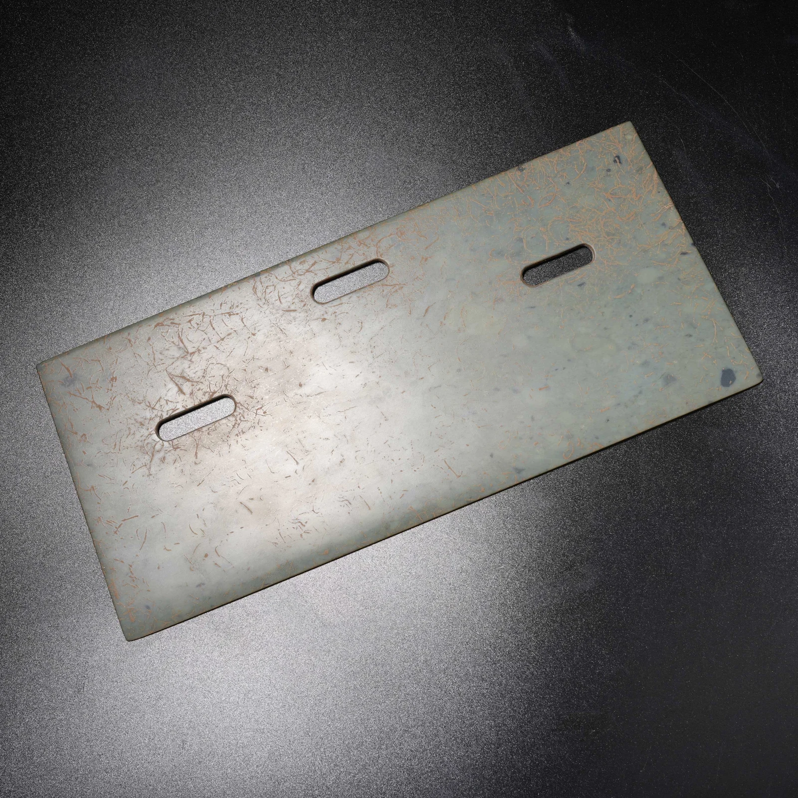 A ANCIENT JADE THREE-HOLED KNIFE