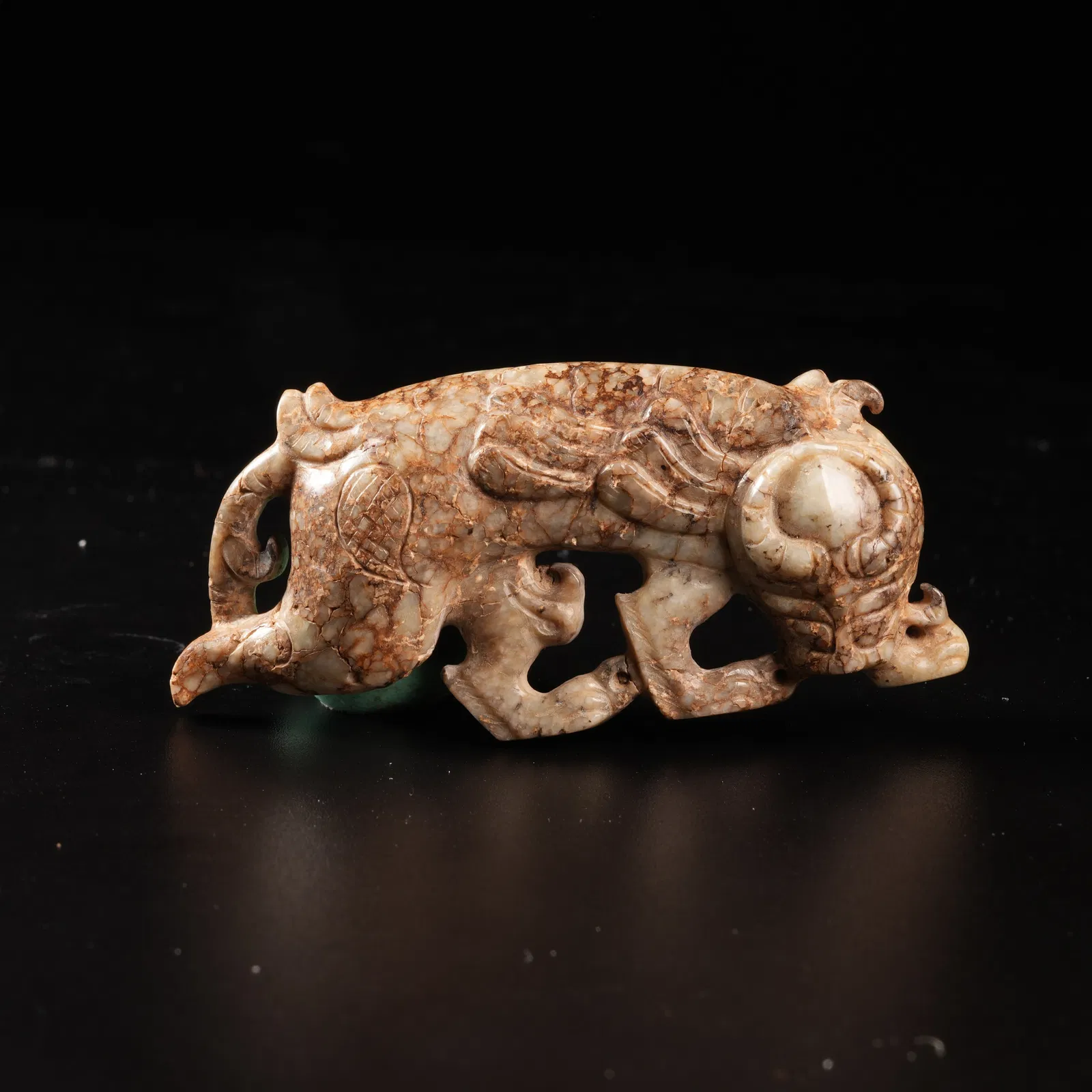 A ARCHAIC JADE BEAST ORNAMENT