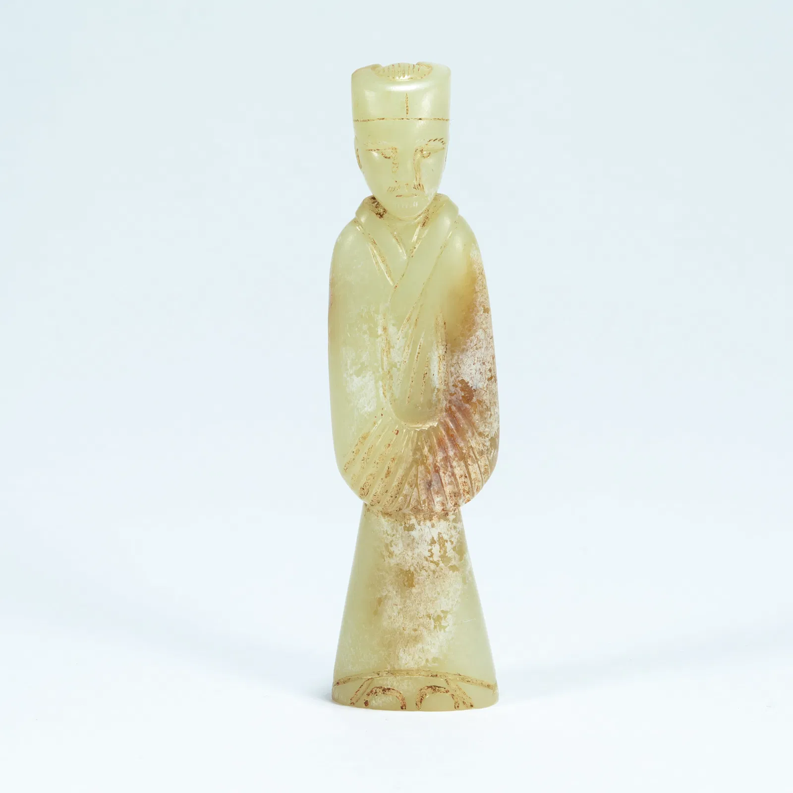 A ARCHAIC JADE CARVED HUMAN FIGURINE