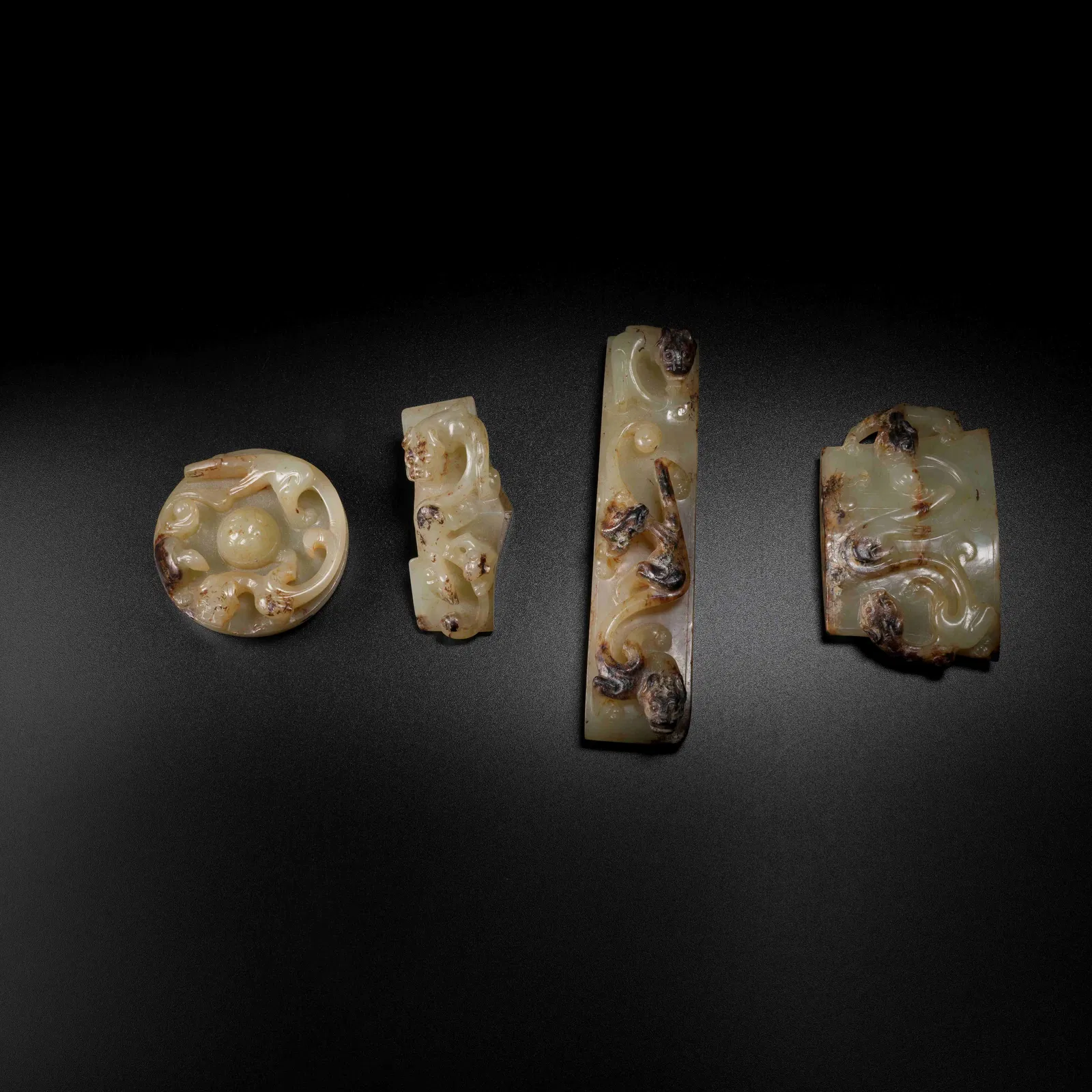 A ARCHAIC JADE CHILONG-PATTERN SWORD FITTINGS SET