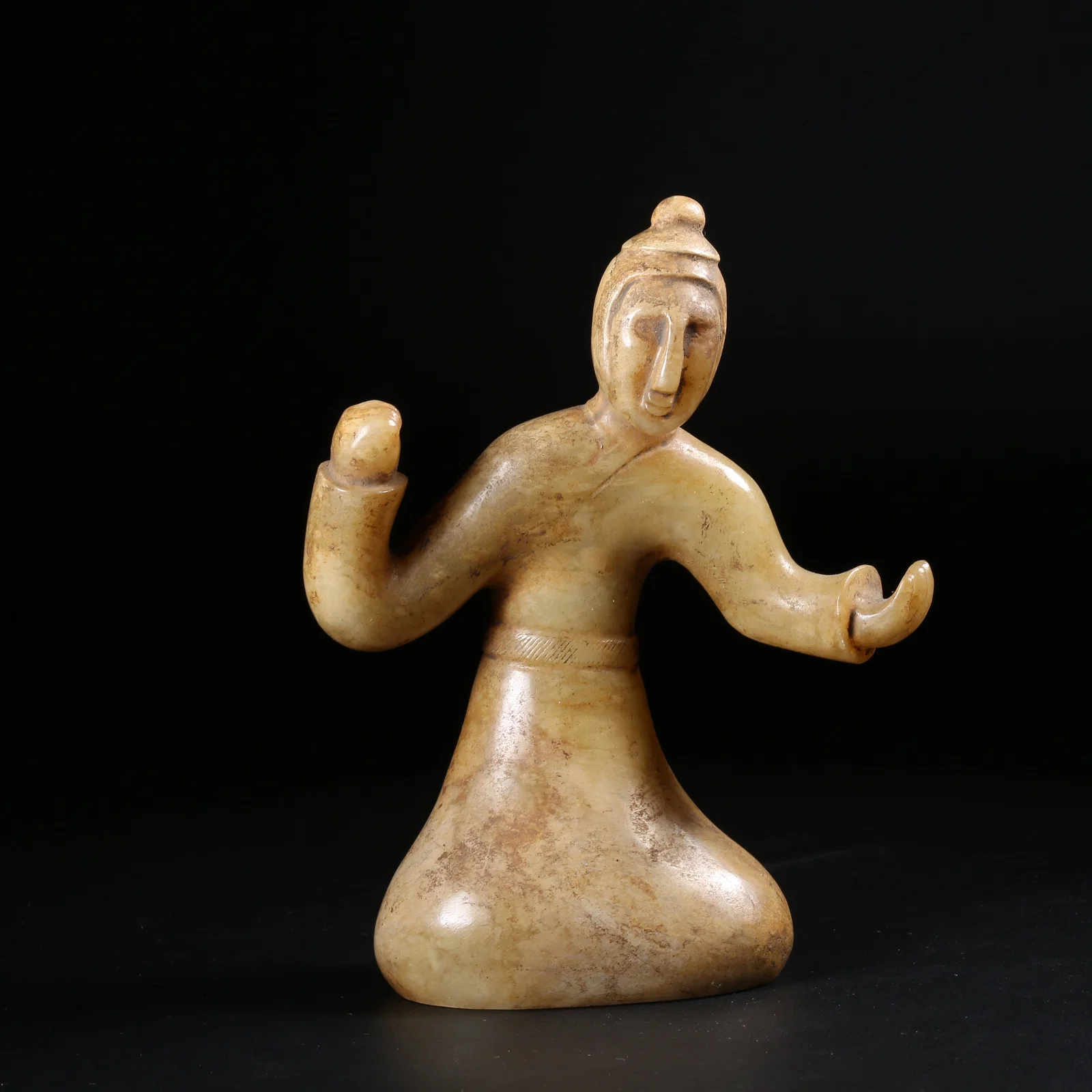 A ARCHAIC JADE DANCING FIGURE FIGURINE