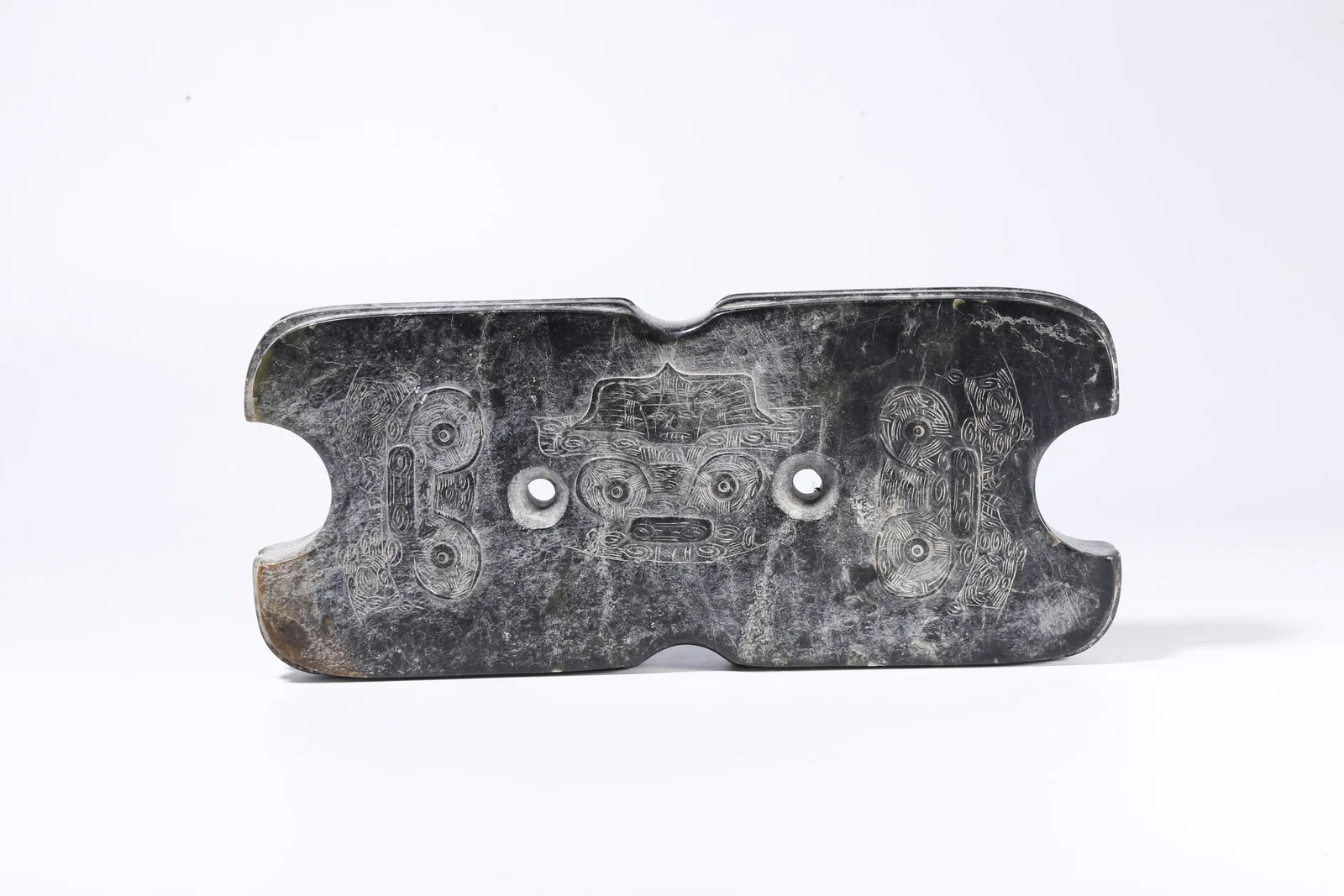 A ARCHAIC JADE ORNAMENT WITH BEAST-FACE DECORATION