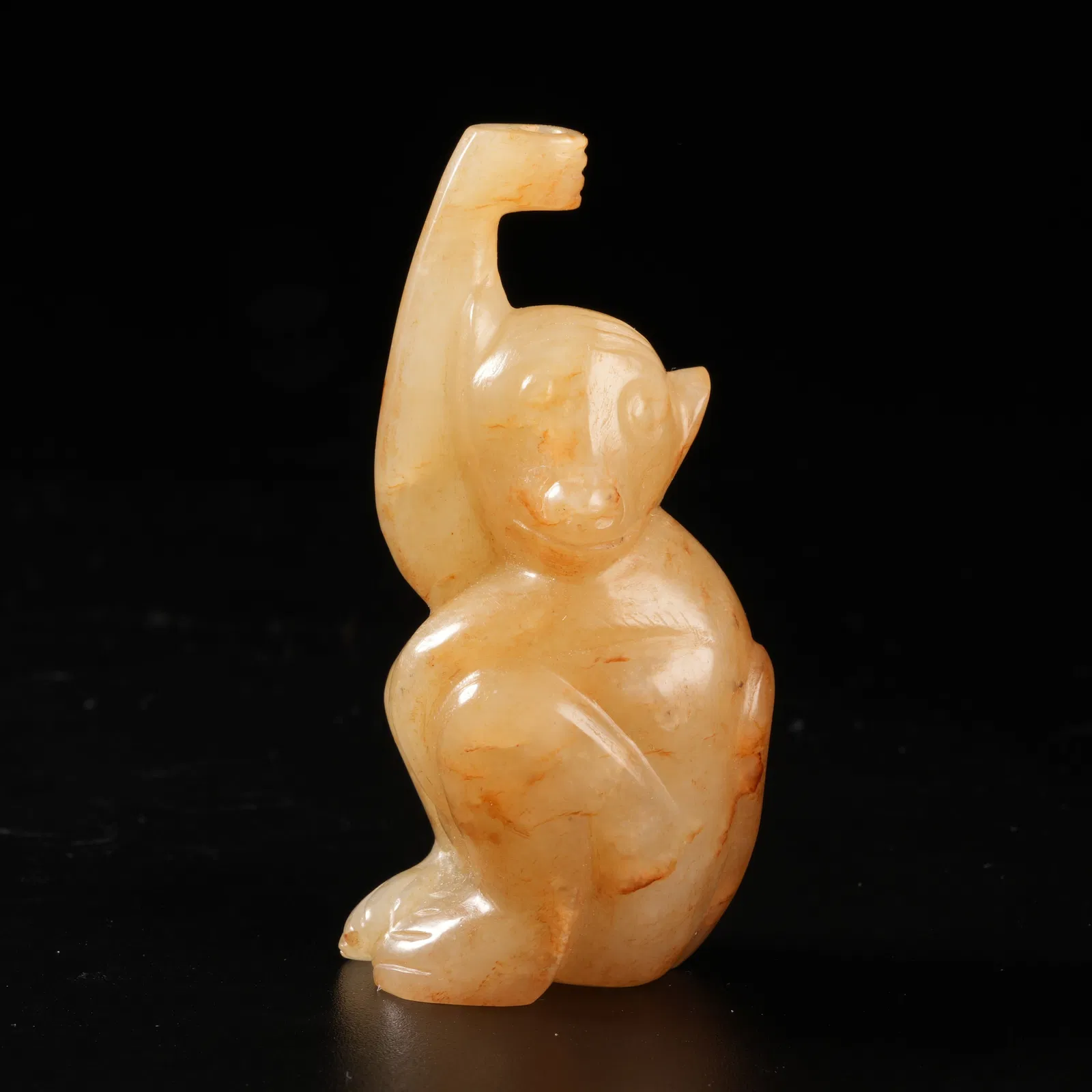 A ARCHAIC JADE SACRED MONKEY ORNAMENT