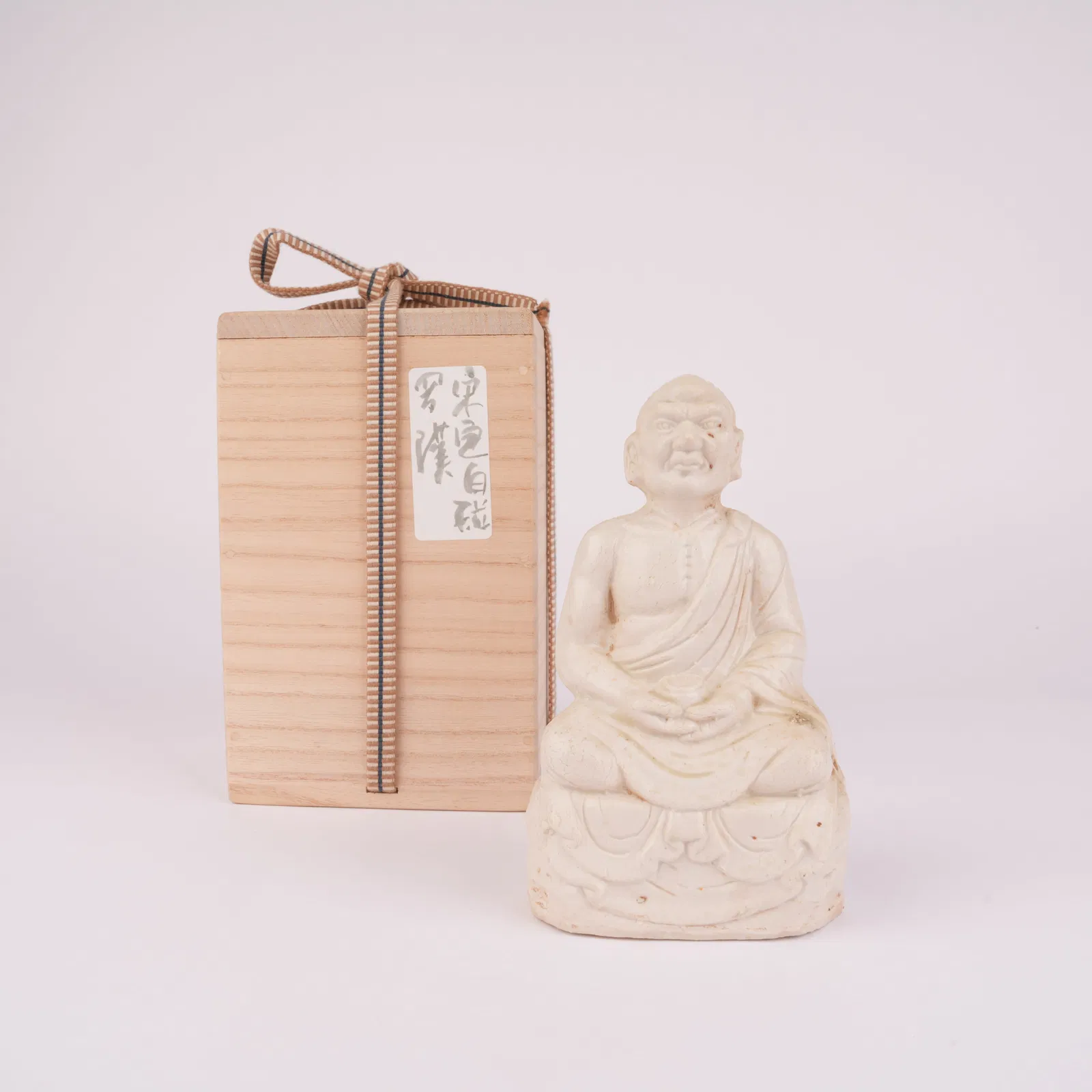 A ARHAT FIGURE, DING KILN, SONG DYNASTY