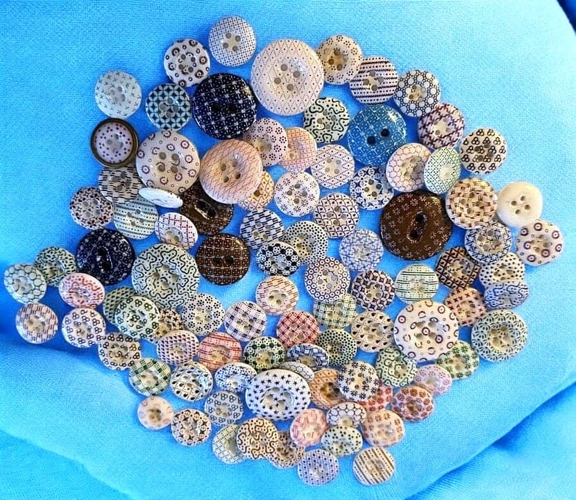 A BAG LOT OF DIVISION ONE CHINA BUTTONS