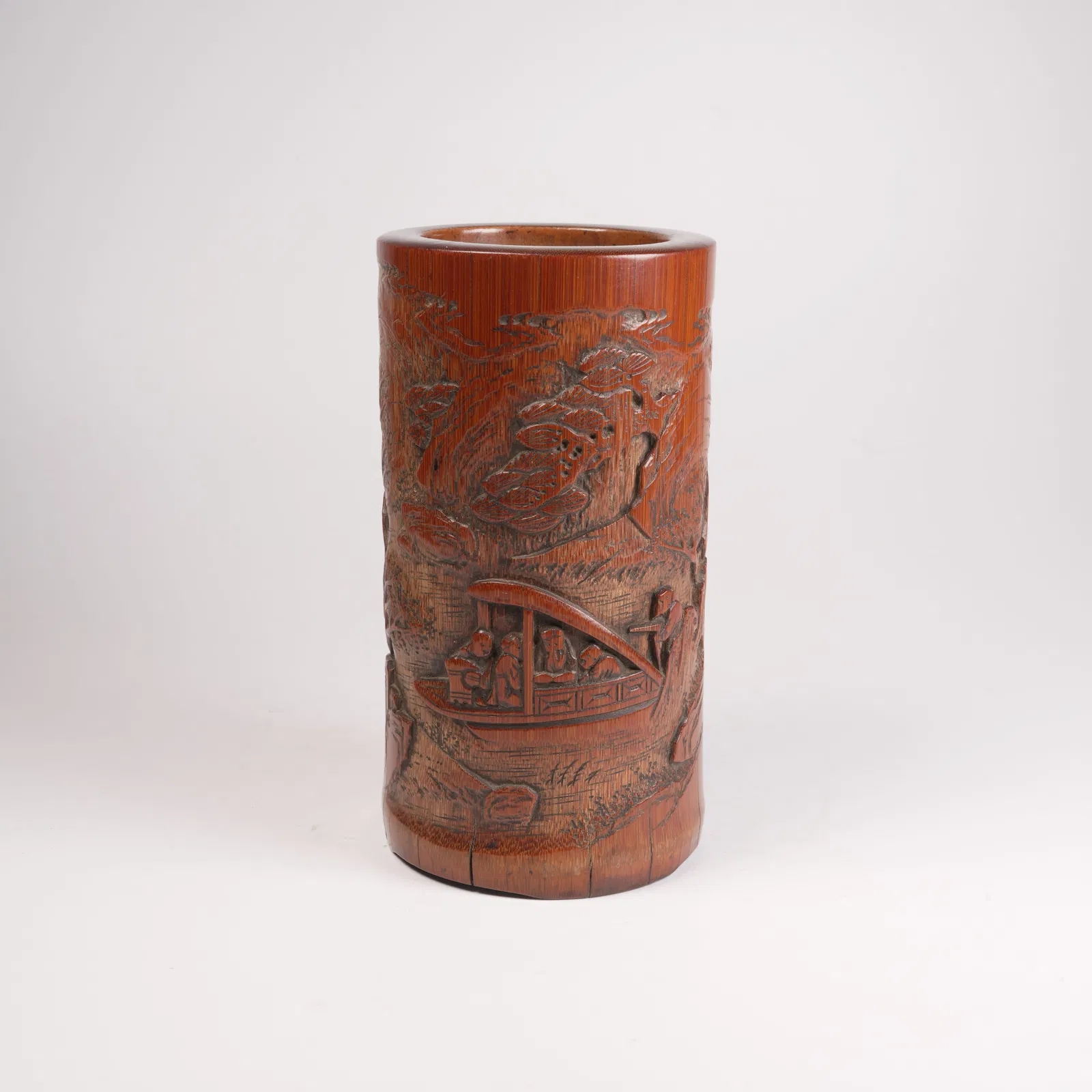 A BAMBOO-CARVED BRUSH POT WITH RED CLIFF MOTIF
