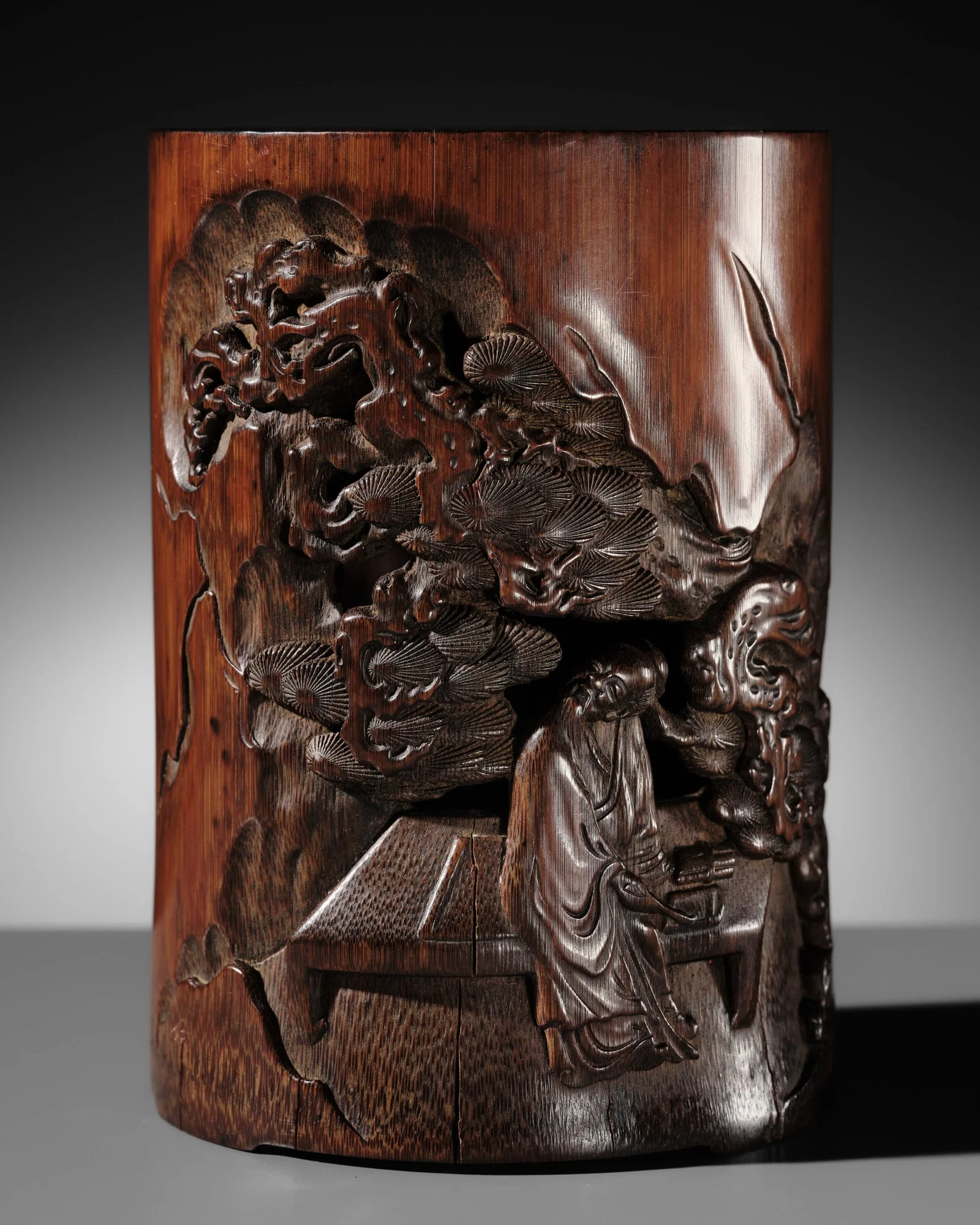 A BAMBOO 'SCHOLAR AND PINE' BRUSHPOT, BITONG, LATE QING DYNASTY TO REPUBLIC PERIOD