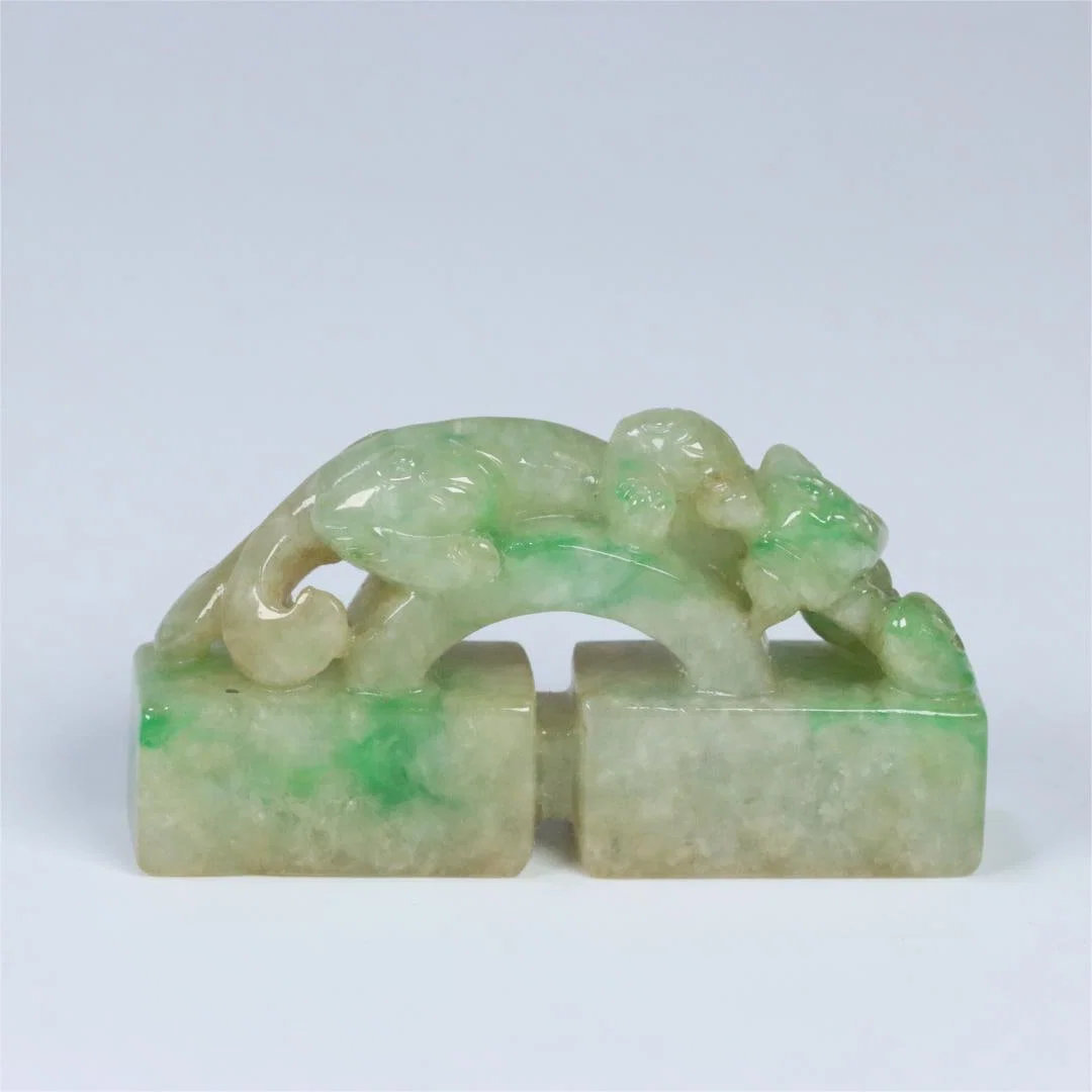 A beautiful old jade dragon offering auspicious button seal