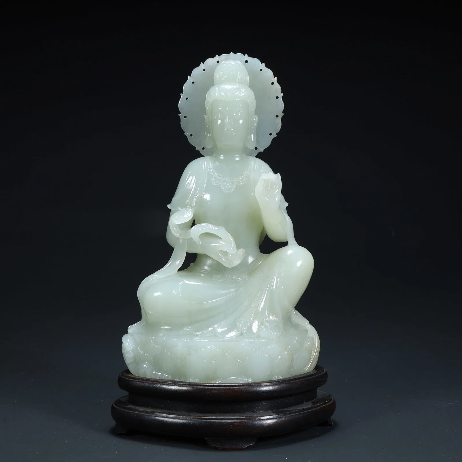 A beautiful seated statue of Guanyin in Hetian jade