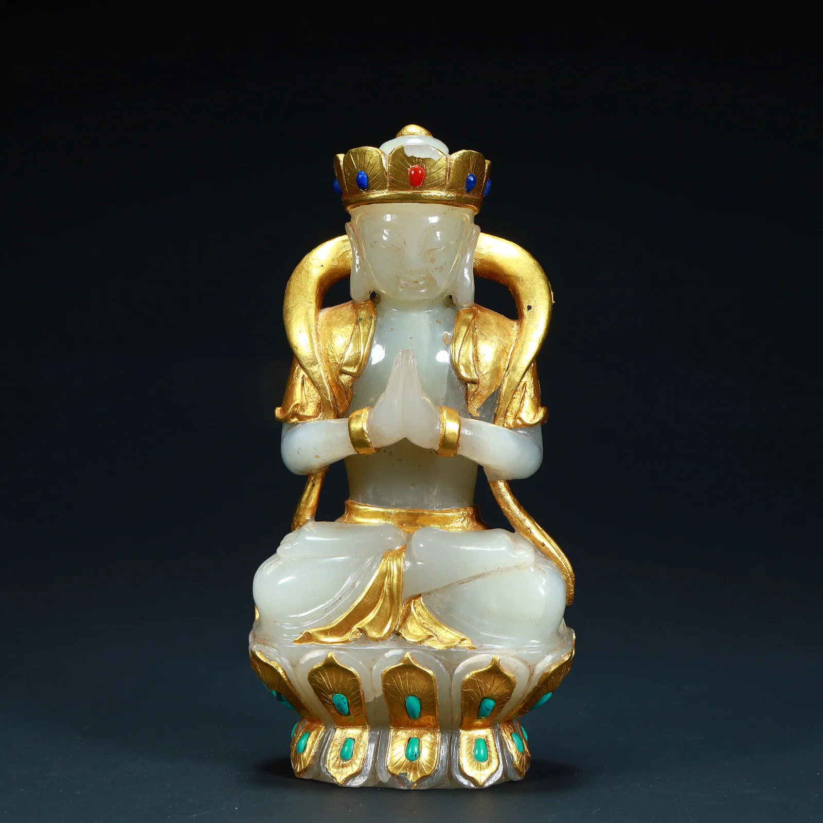 A beautiful seated statue of the Bodhisattva with Hetian white jade and gold inlaid treasures