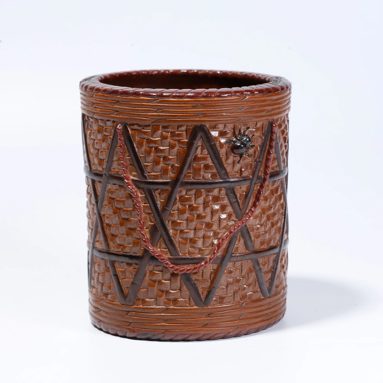 A BIOMORPHIC PORCELAIN BRUSH HOLDER