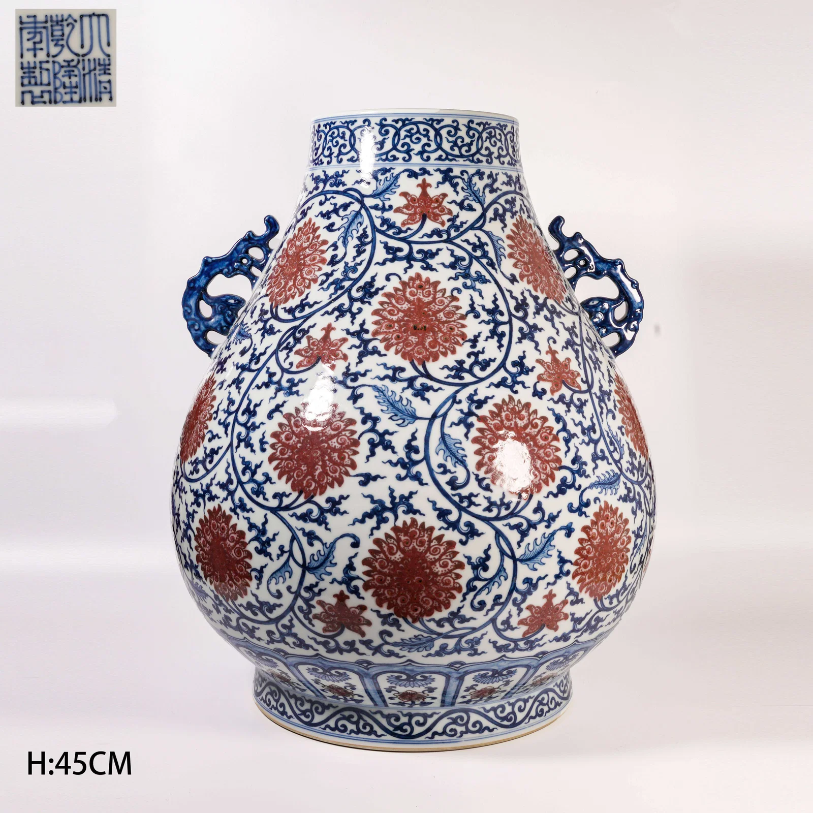 A BLUE-AND-WHITE AND IRON-RED DOUBLE-HANDLED ZUN WITH INTERTWINING PASSIONFLOWER DESIGN