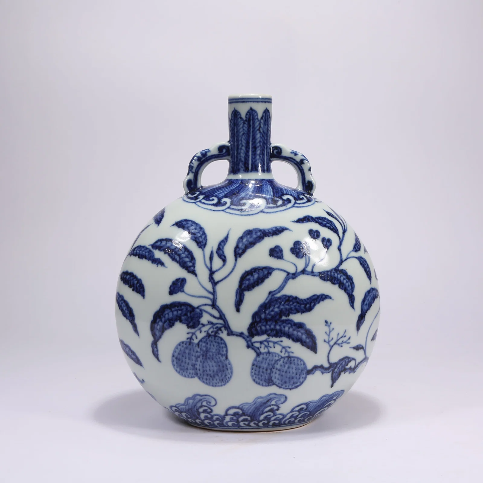 A BLUE-AND-WHITE "AUSPICIOUS FRUITS" MOONFLASK
