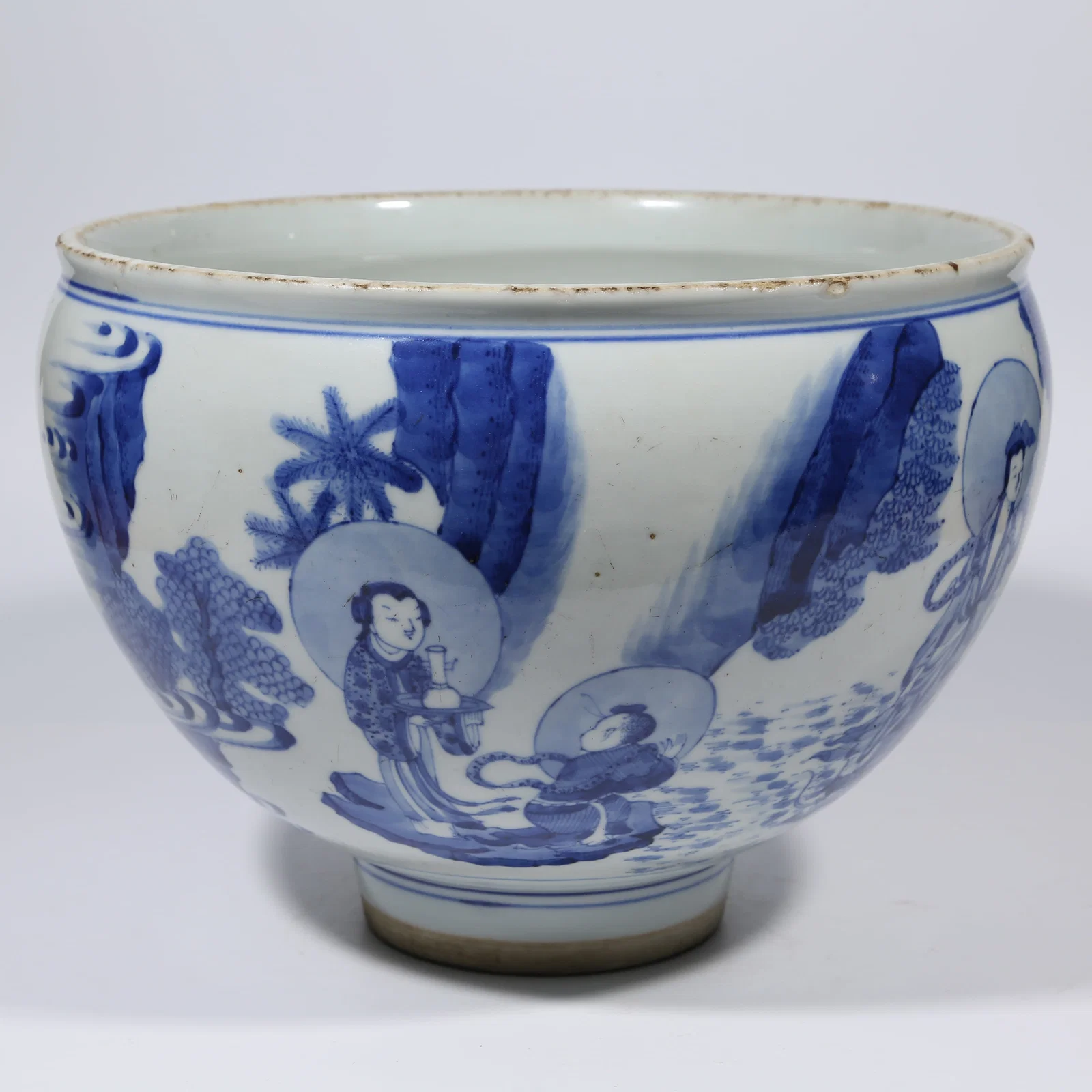A BLUE-AND-WHITE BOWL WITH CHILD PAYING HOMAGE TO GUANYIN MOTIF
