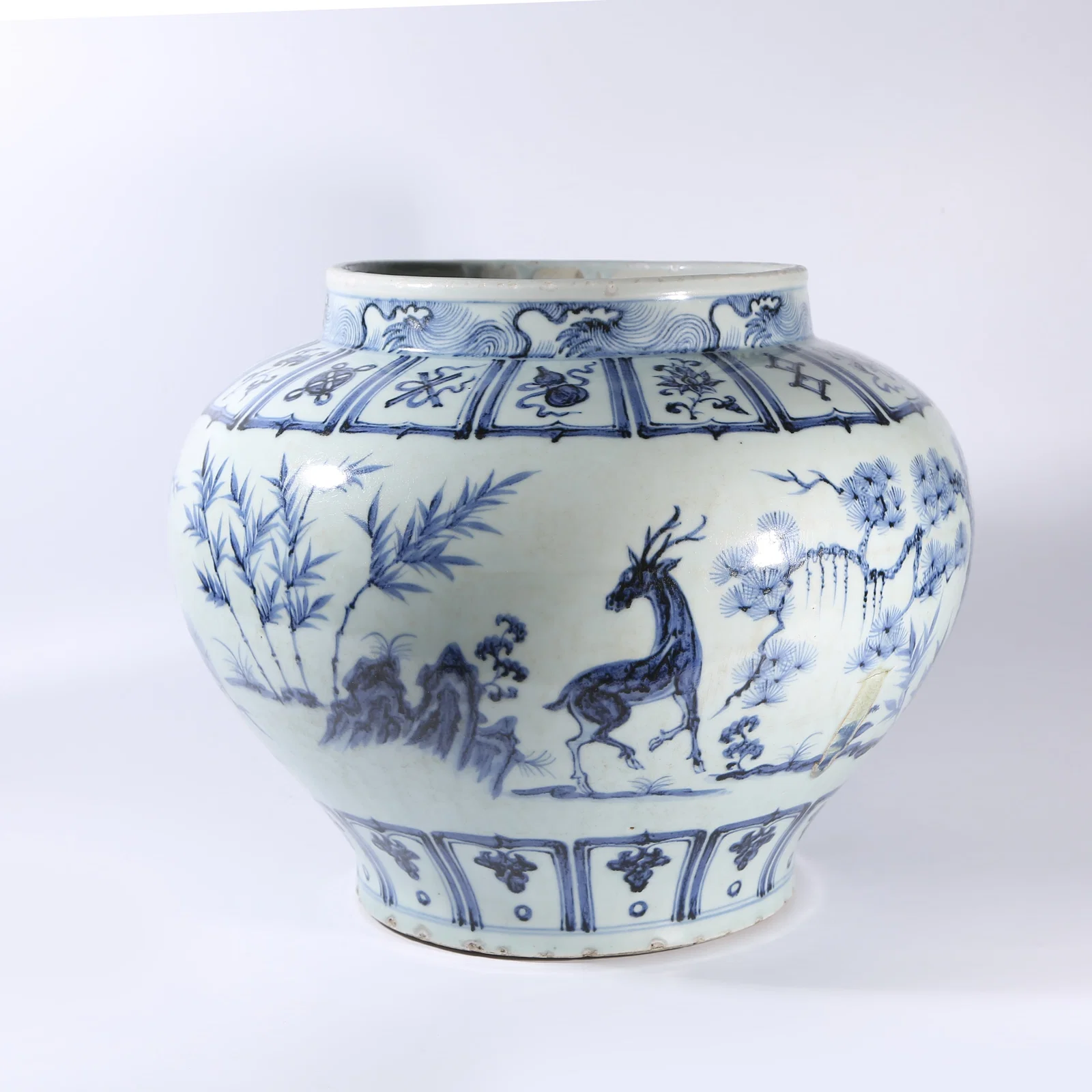 A BLUE-AND-WHITE JAR WITH "THREE FRIENDS OF WINTER" MOTIF