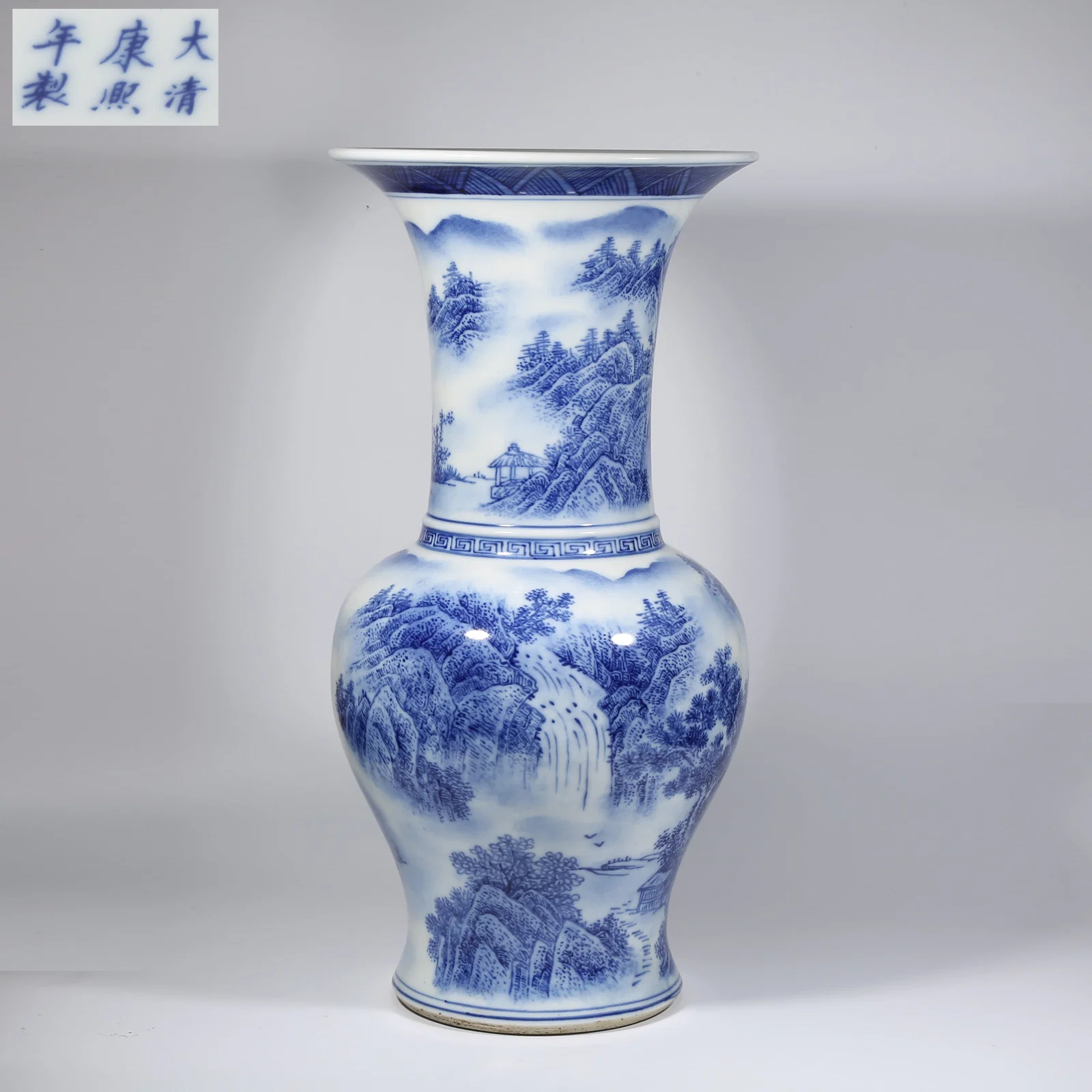 A BLUE-AND-WHITE LANDSCAPE VASE WITH PHOENIX TAIL
