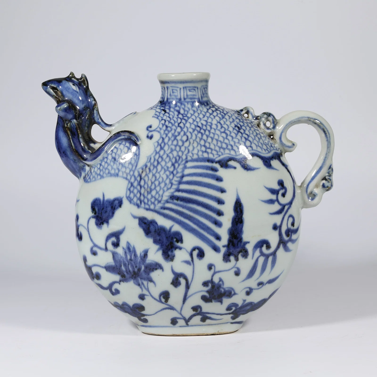 A BLUE-AND-WHITE PHOENIX-HEAD EWER