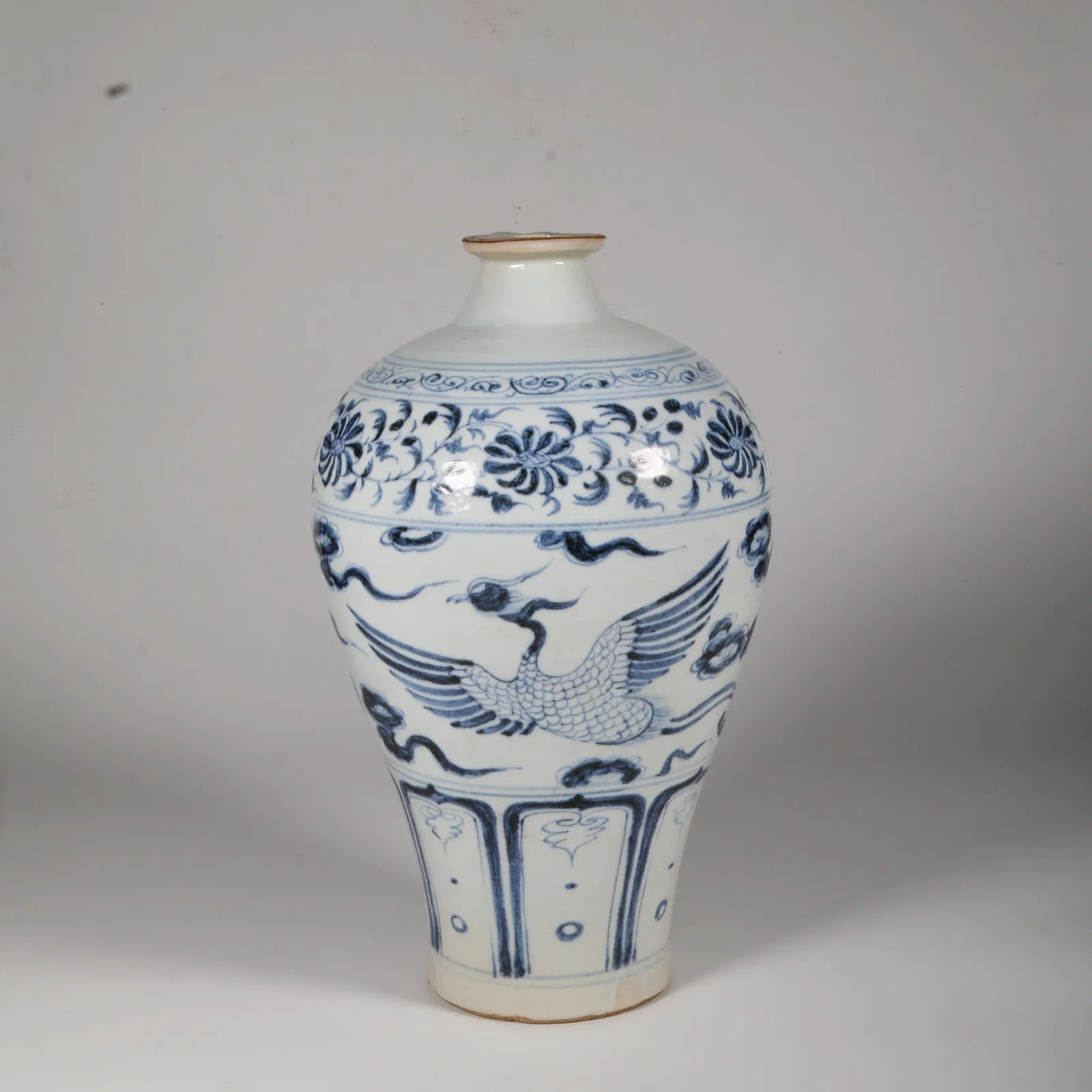 A BLUE-AND-WHITE PRUNUS VASE WITH PHOENIX MOTIF