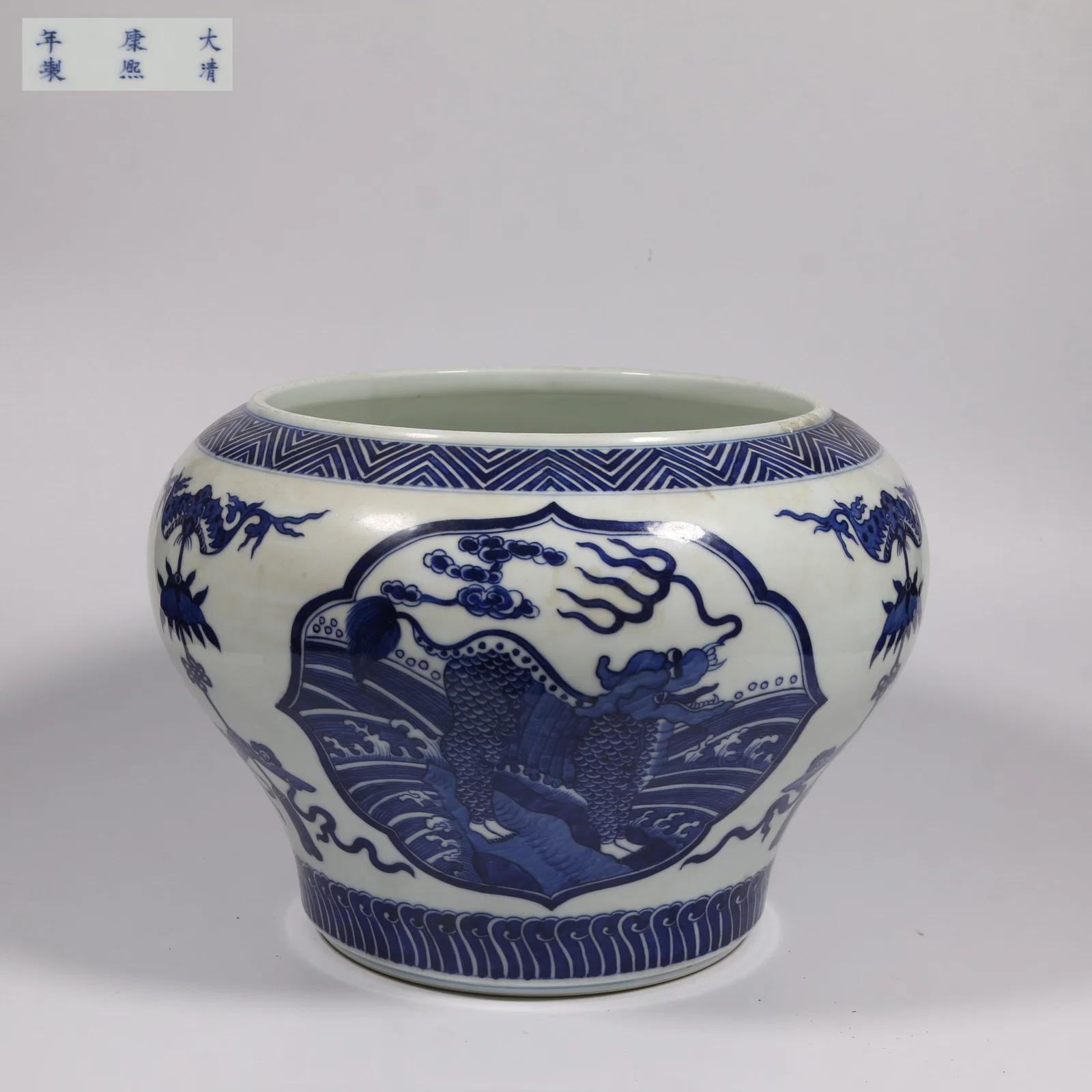 A BLUE AND WHITE SEA MONSTER JAR