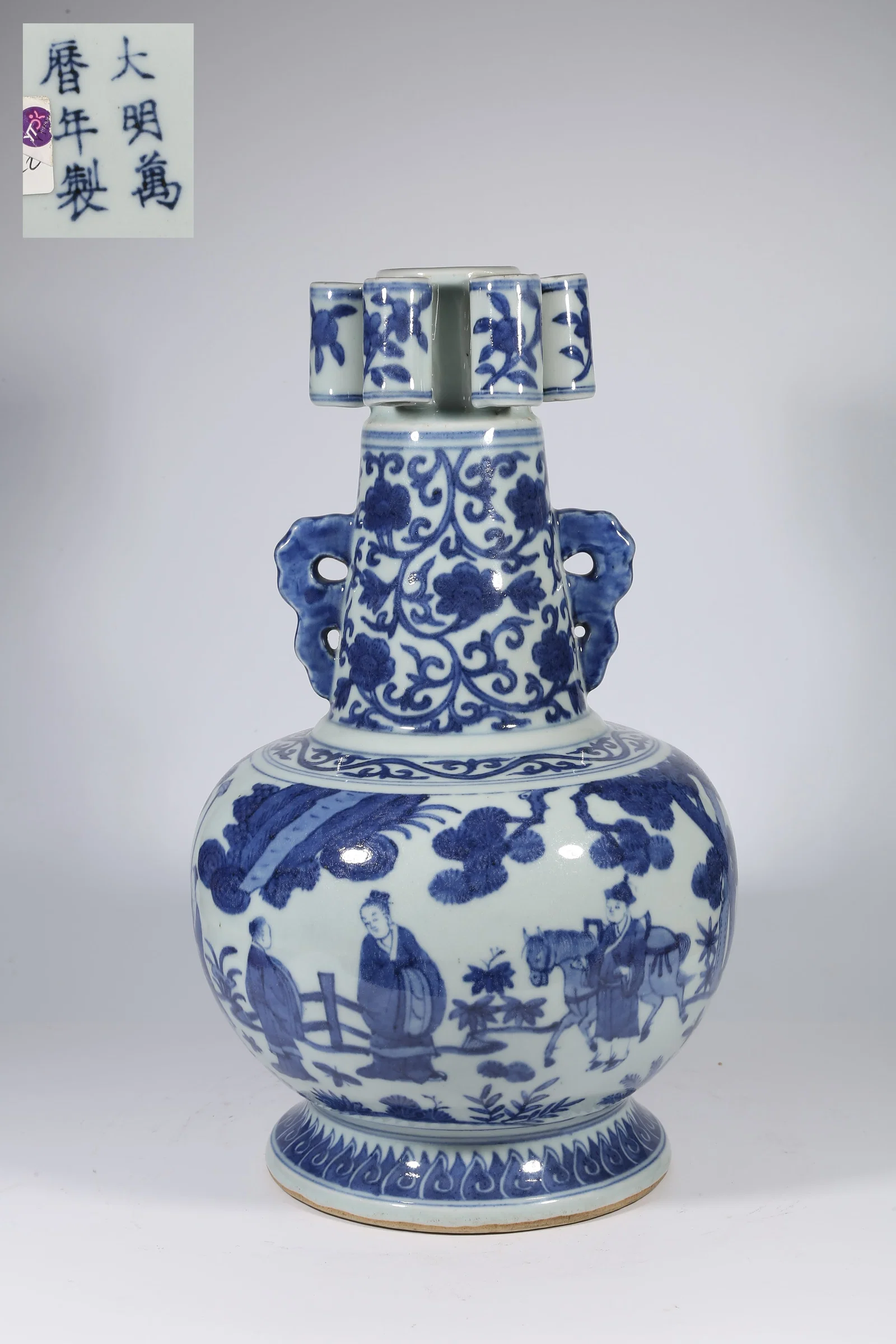 A BLUE-AND-WHITE SEVEN-HOLE VASE WITH NARRATIVE FIGURES