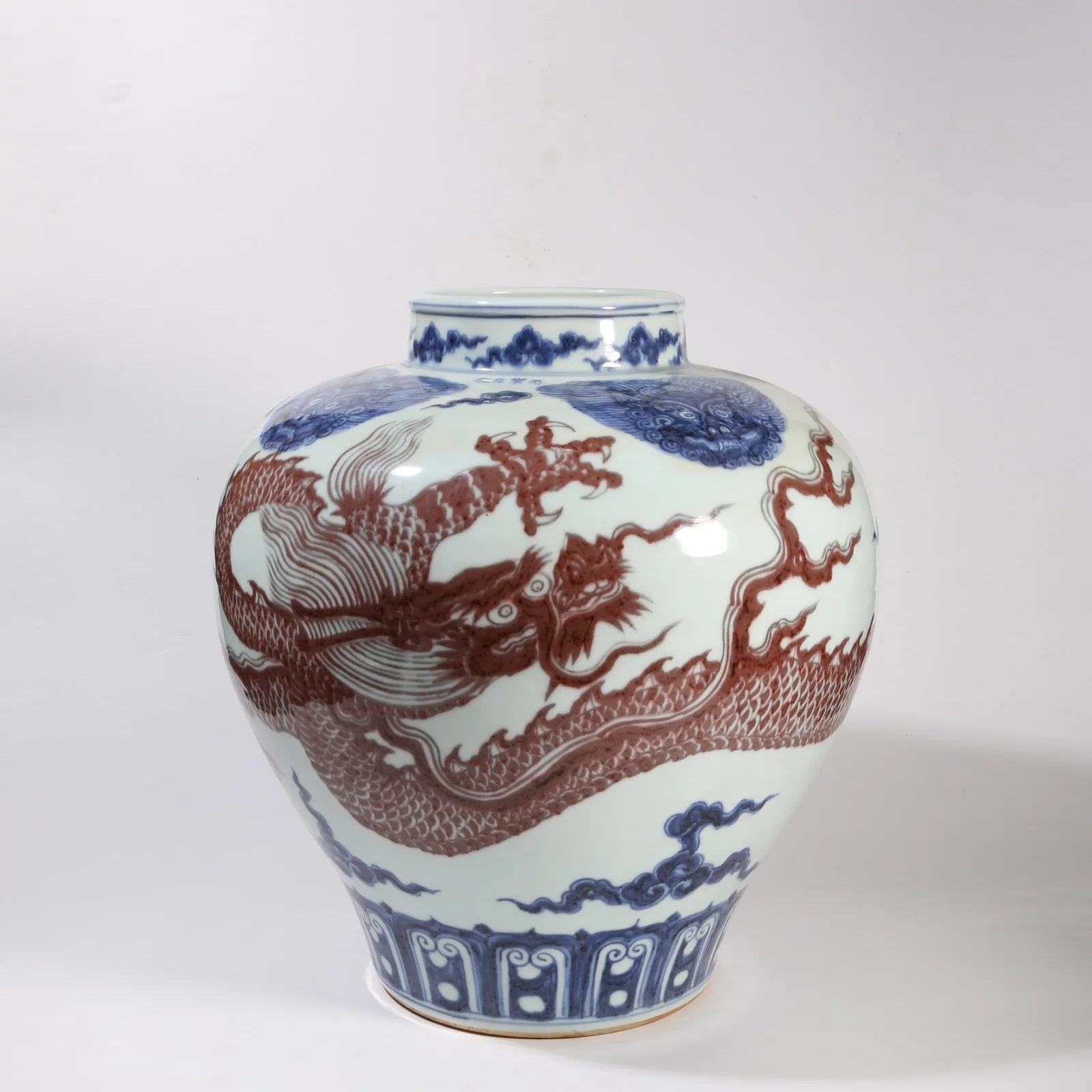 A BLUE-AND-WHITE UNDERGLAZE RED PRUNUS VASE WITH CLOUD AND DRAGON MOTIF