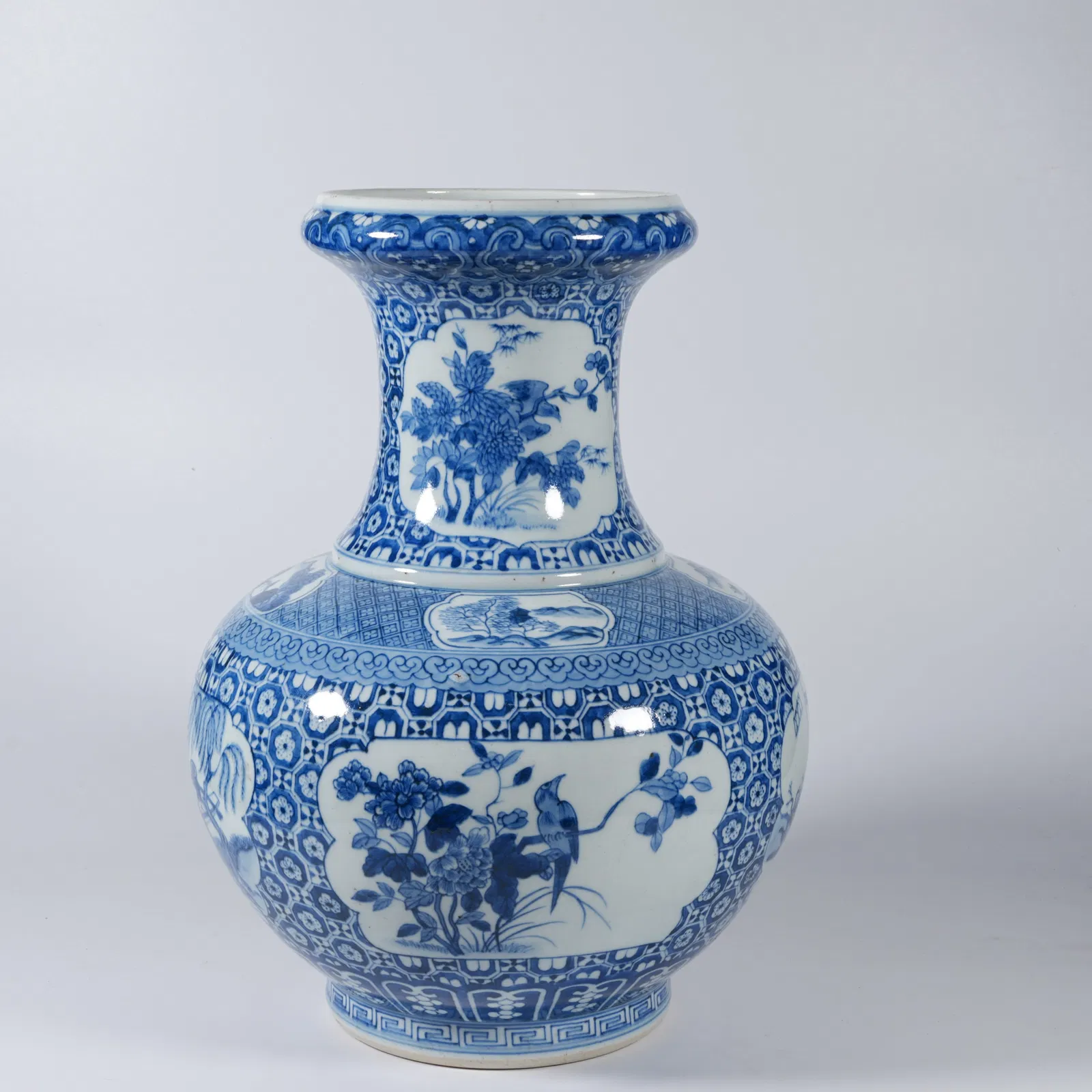 A BLUE-AND-WHITE VASE WITH FLOWERS, BIRDS, AND FIGURAL NARRATIVE SCENES (SHANGPING)