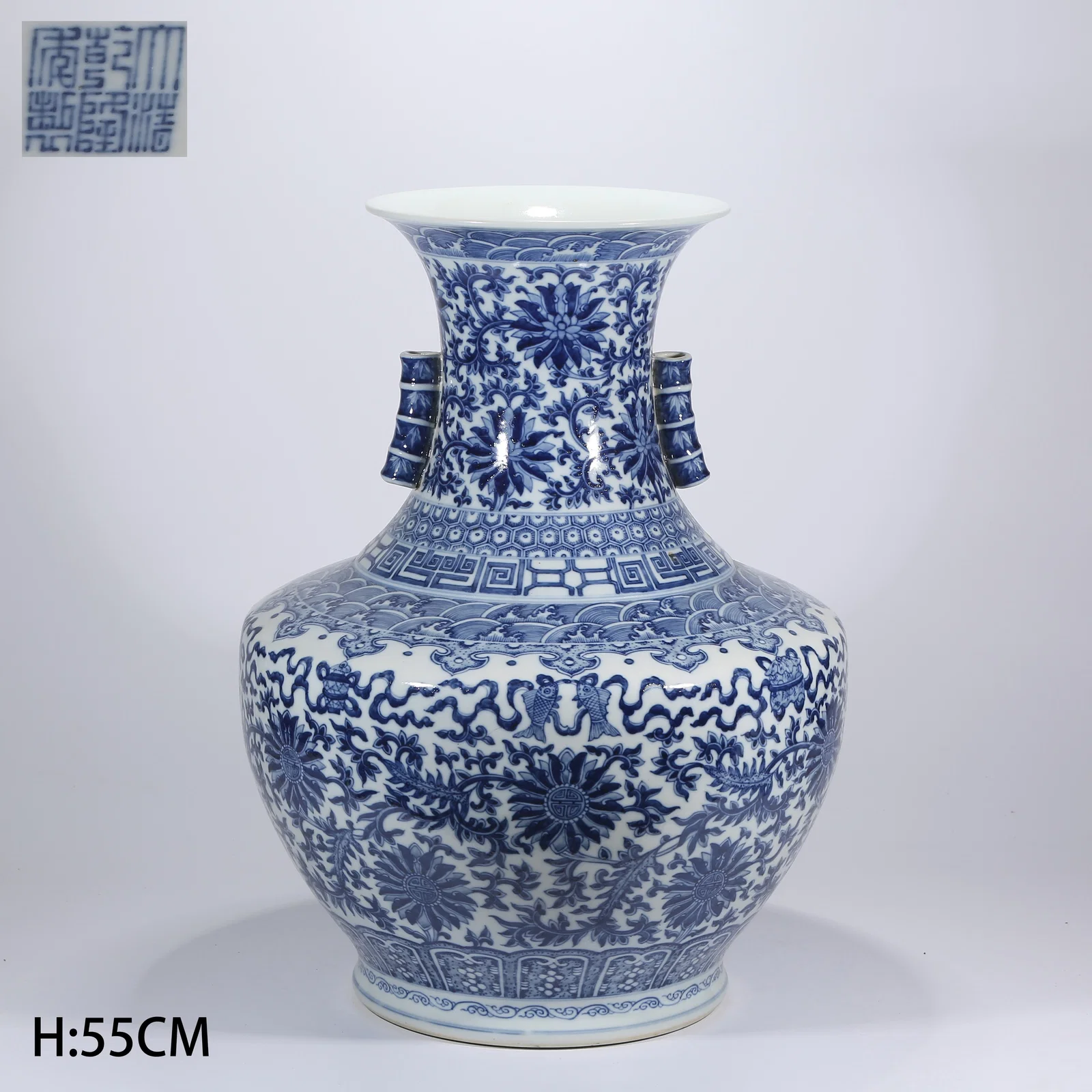 A BLUE-AND-WHITE VASE WITH LAPPET-HANDLED VINE AND FLORAL PATTERN