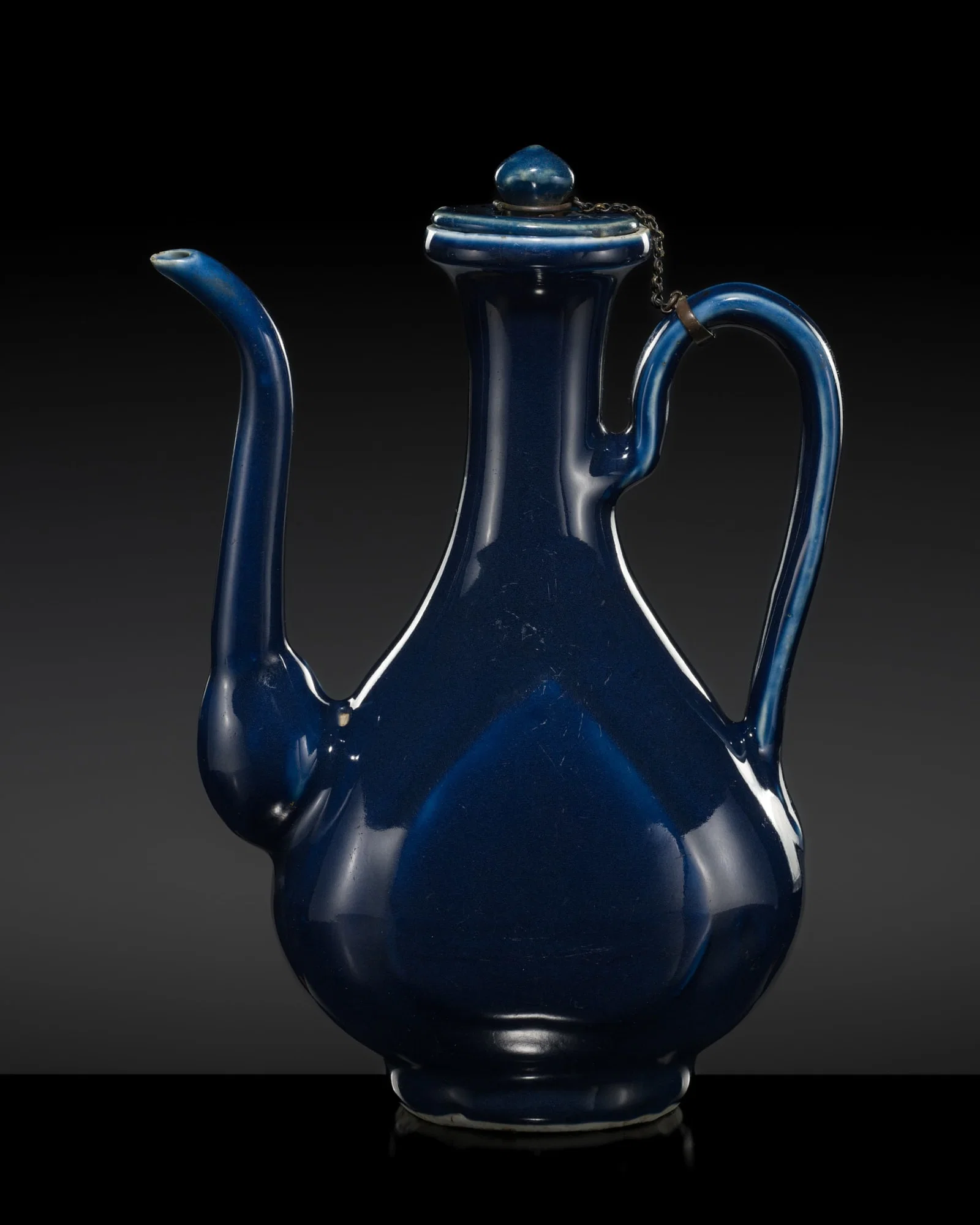 A BLUE-GLAZED EWER AND COVER, MING DYNASTY
