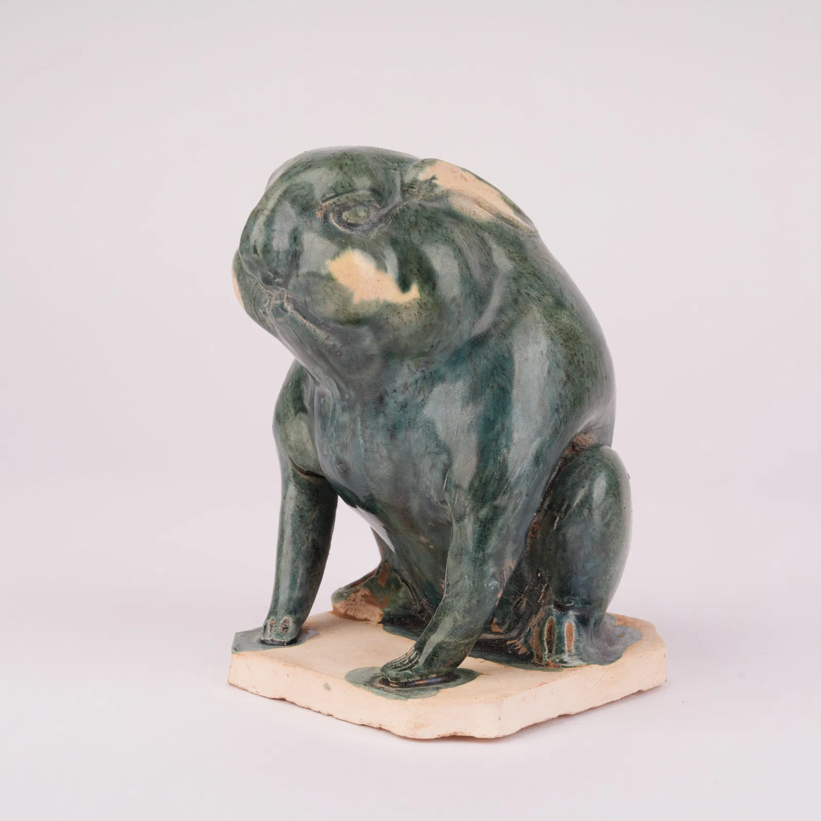 A BLUE-GLAZED RABBIT, TANG DYNASTY