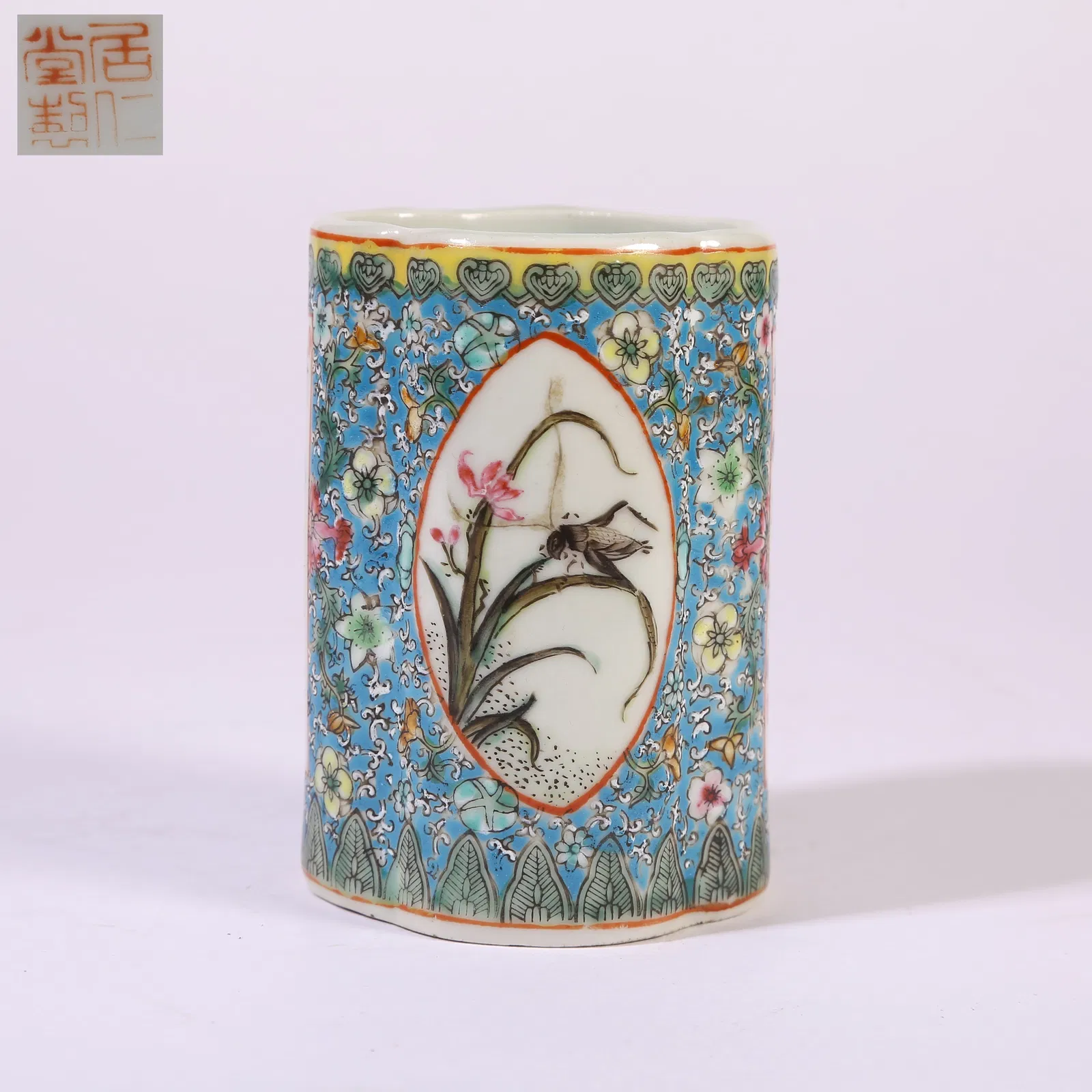 A BLUE-GROUND FAMILLE-ROSE PANELLED BRUSH POT WITH CORDYCEPS MOTIFS