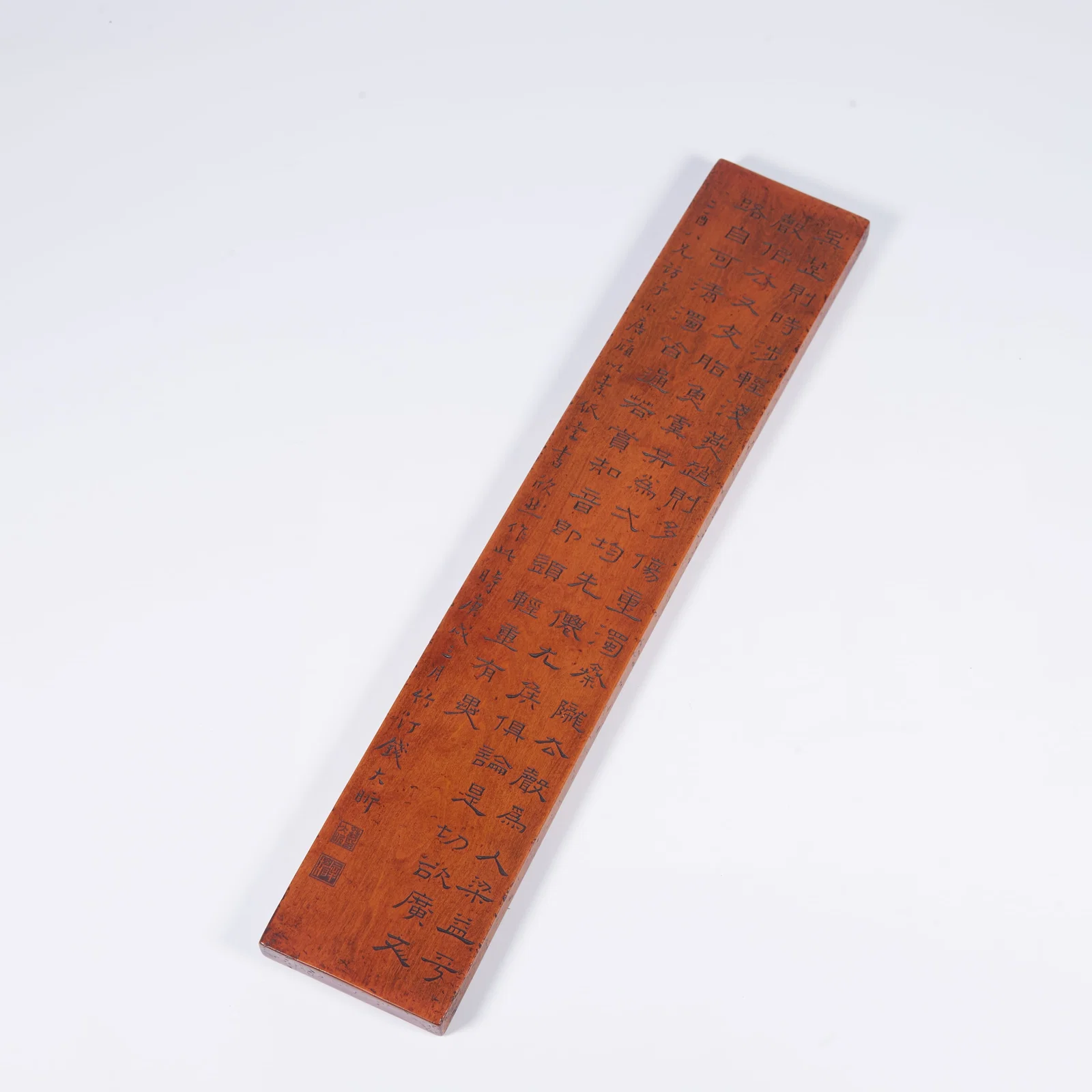 A BOXWOOD PAPERWEIGHT WITH POETIC INSCRIPTION